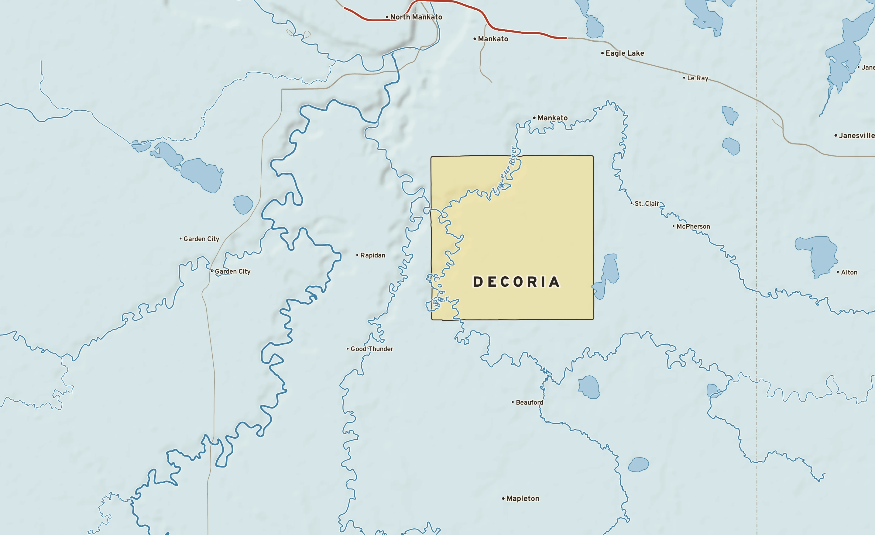 Shaded-relief atlas plate of Decoria, Minnesota: rivers, roads, the city limits and where the water drains.