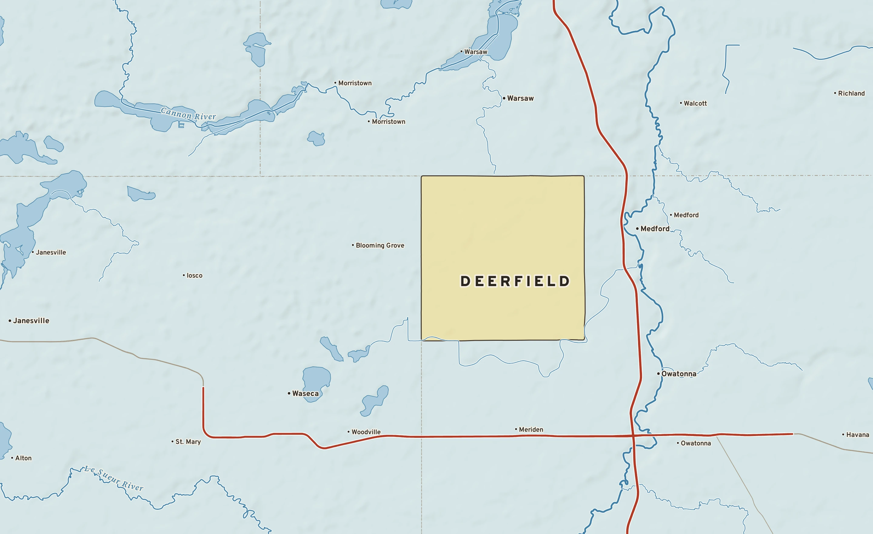 Shaded-relief atlas plate of Deerfield, Minnesota: rivers, roads, the city limits and where the water drains.