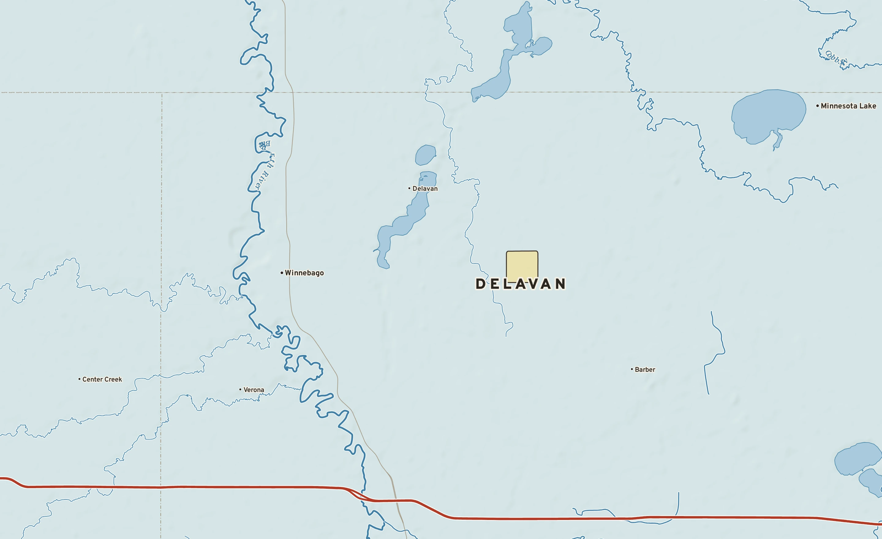 Shaded-relief atlas plate of Delavan, Minnesota: rivers, roads, the city limits and where the water drains.