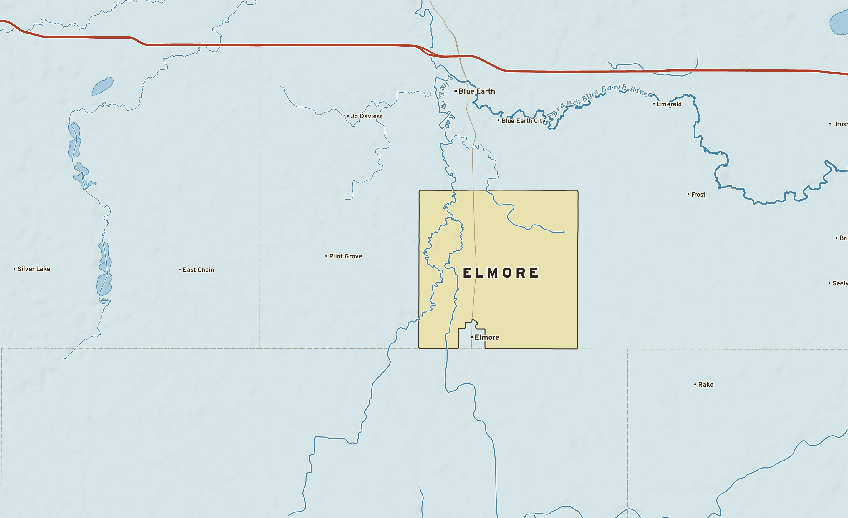 Shaded-relief atlas plate of Elmore, Minnesota: rivers, roads, the city limits and where the water drains.