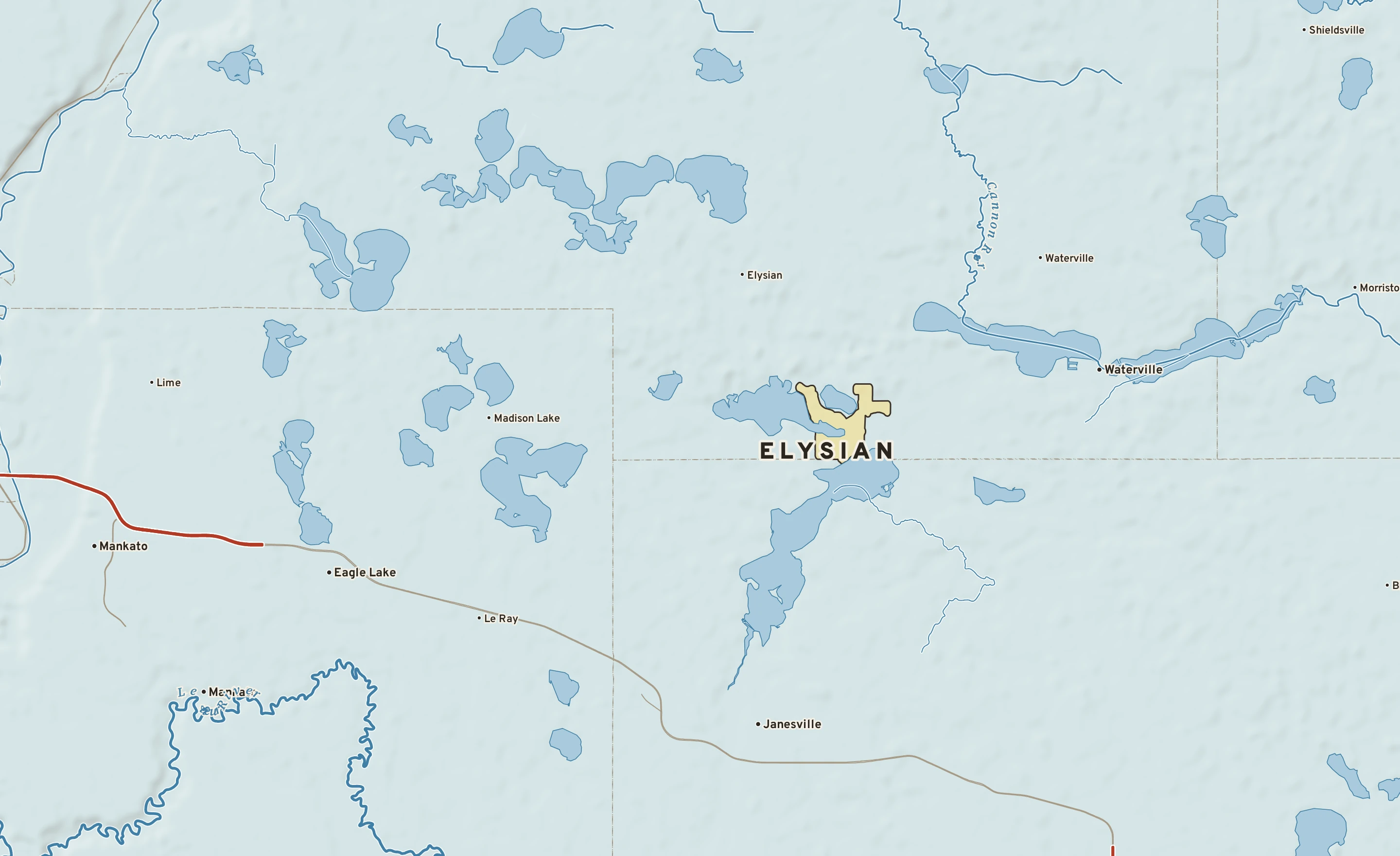 Shaded-relief atlas plate of Elysian, Minnesota: rivers, roads, the city limits and where the water drains.