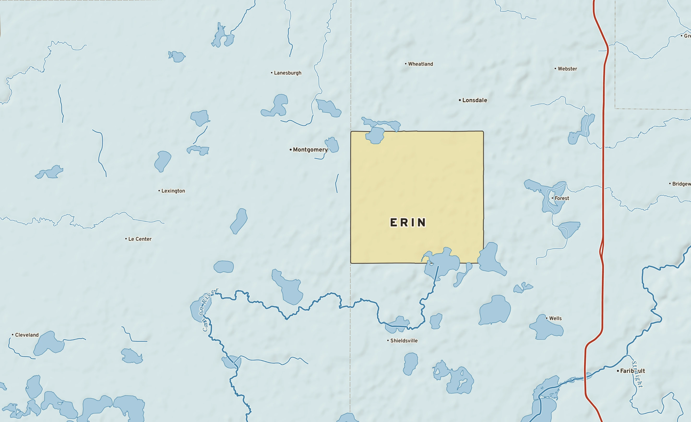 Shaded-relief atlas plate of Erin, Minnesota: rivers, roads, the city limits and where the water drains.