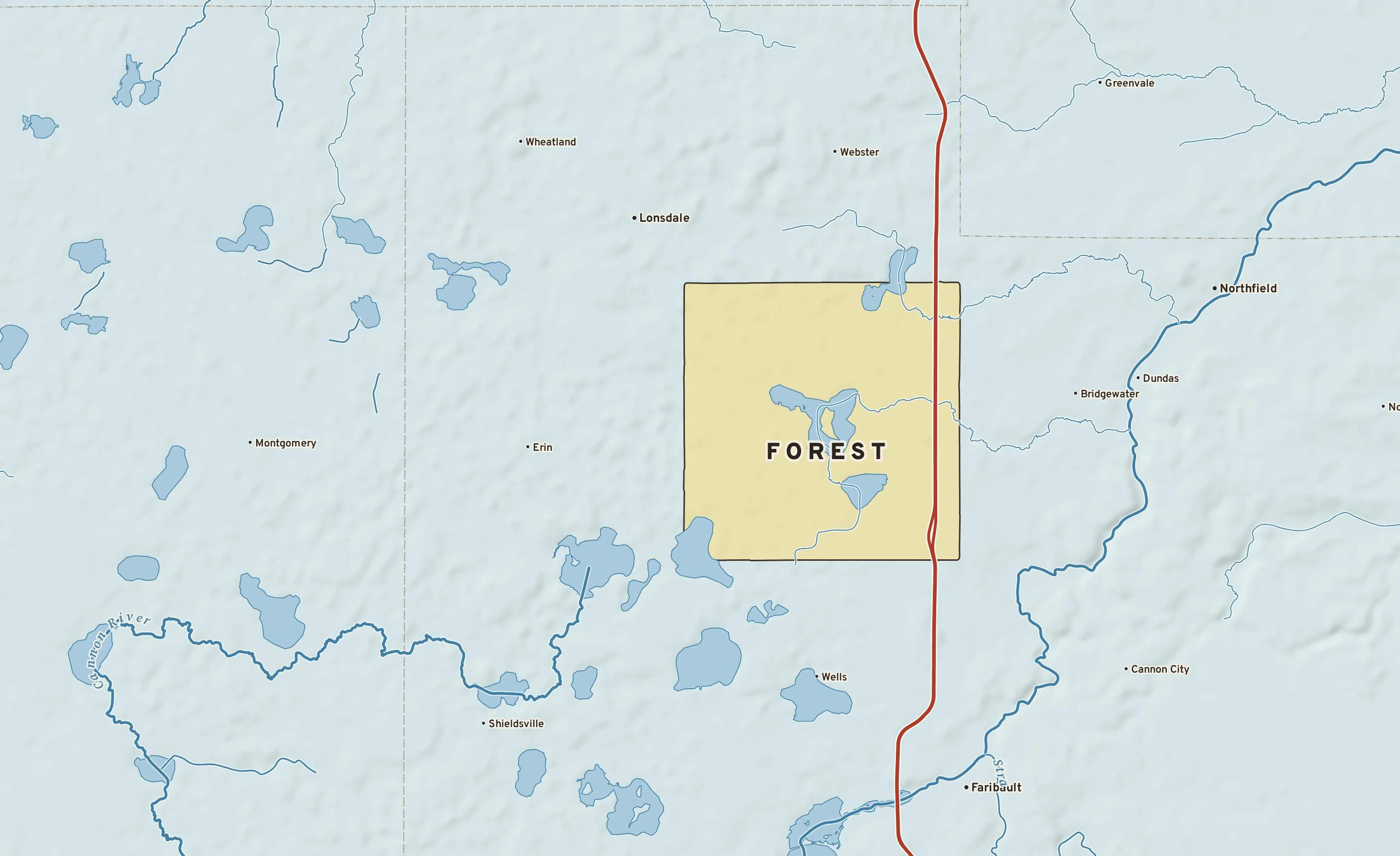 Shaded-relief atlas plate of Forest, Minnesota: rivers, roads, the city limits and where the water drains.