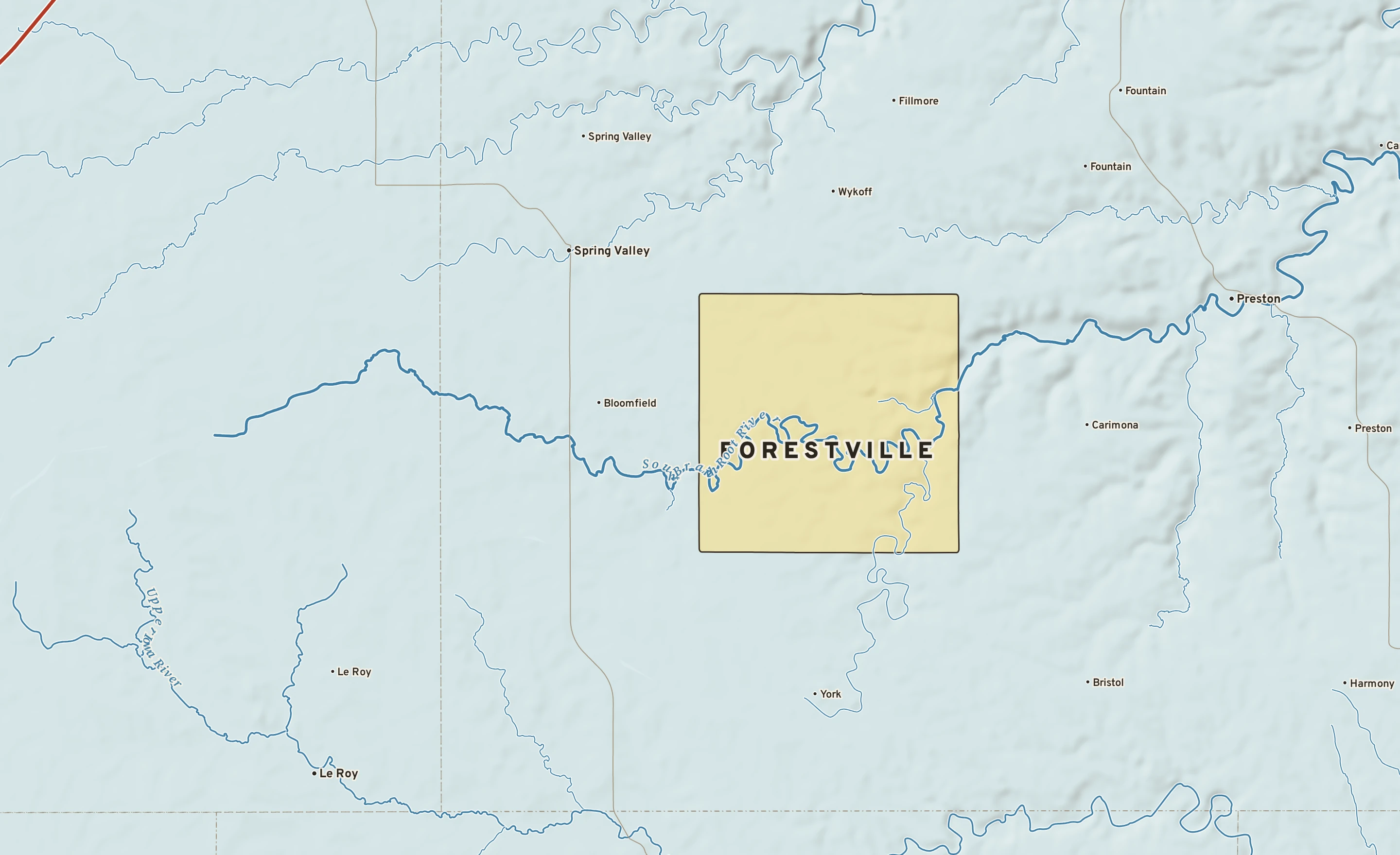 Shaded-relief atlas plate of Forestville, Minnesota: rivers, roads, the city limits and where the water drains.
