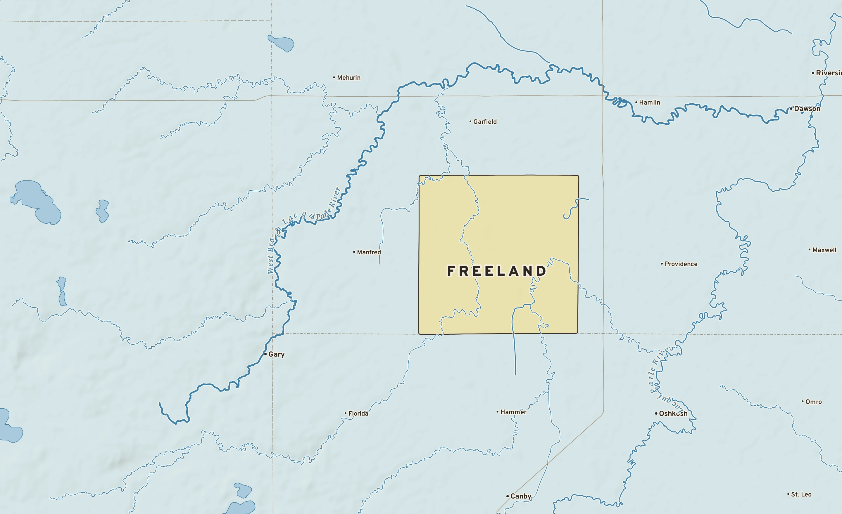 Shaded-relief atlas plate of Freeland, Minnesota: rivers, roads, the city limits and where the water drains.