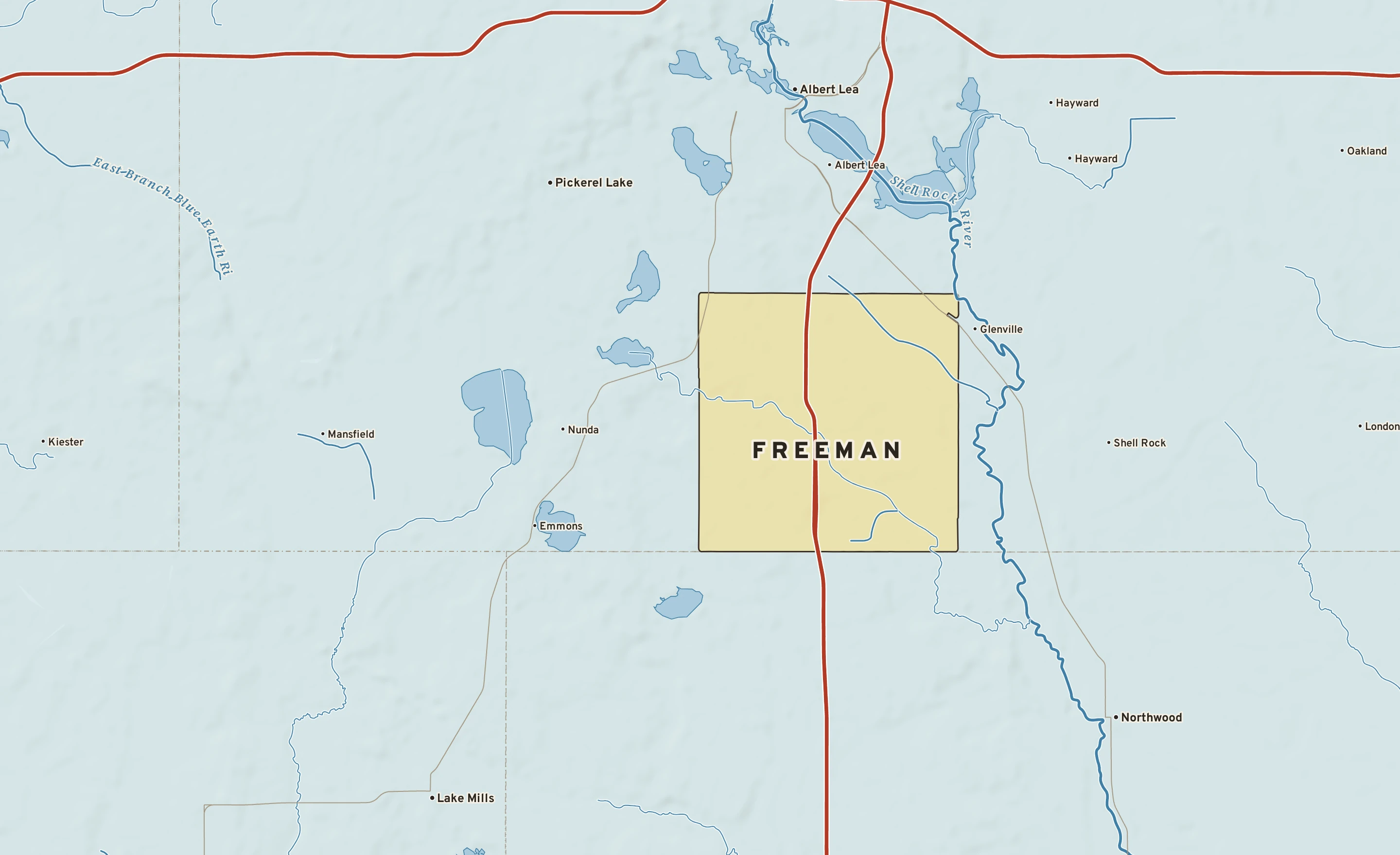 Shaded-relief atlas plate of Freeman, Minnesota: rivers, roads, the city limits and where the water drains.