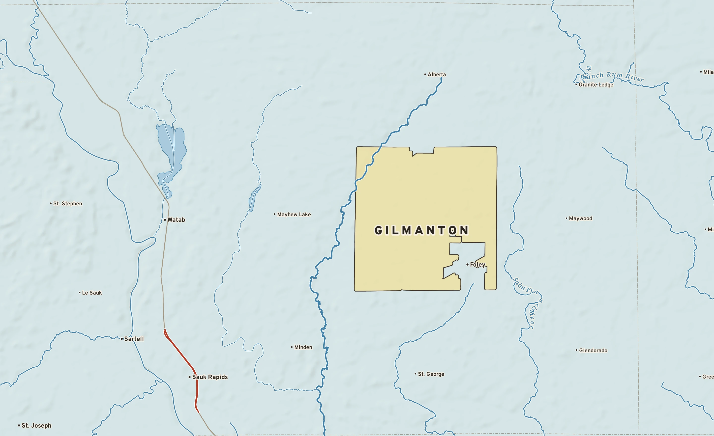 Shaded-relief atlas plate of Gilmanton, Minnesota: rivers, roads, the city limits and where the water drains.