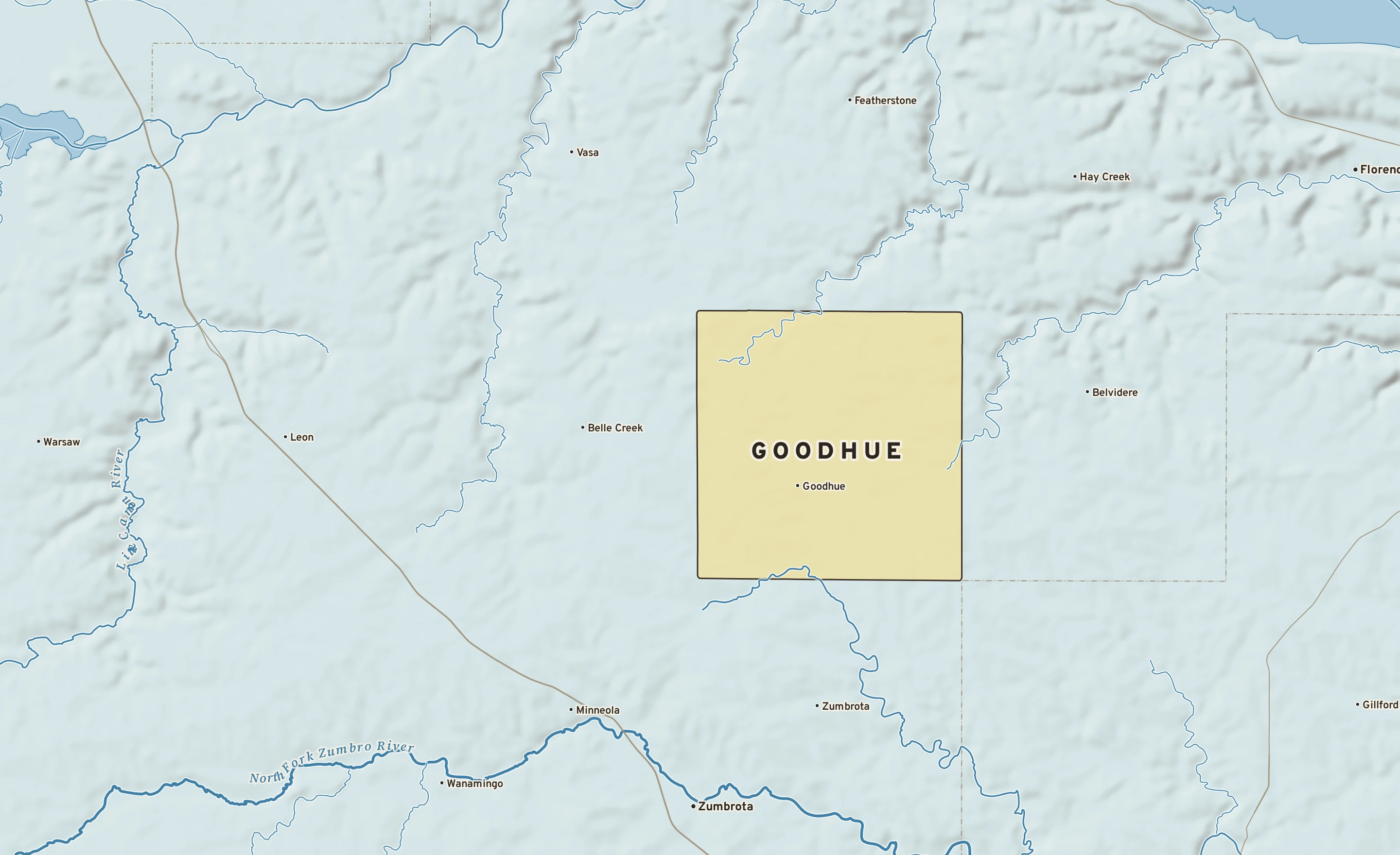 Shaded-relief atlas plate of Goodhue, Minnesota: rivers, roads, the city limits and where the water drains.