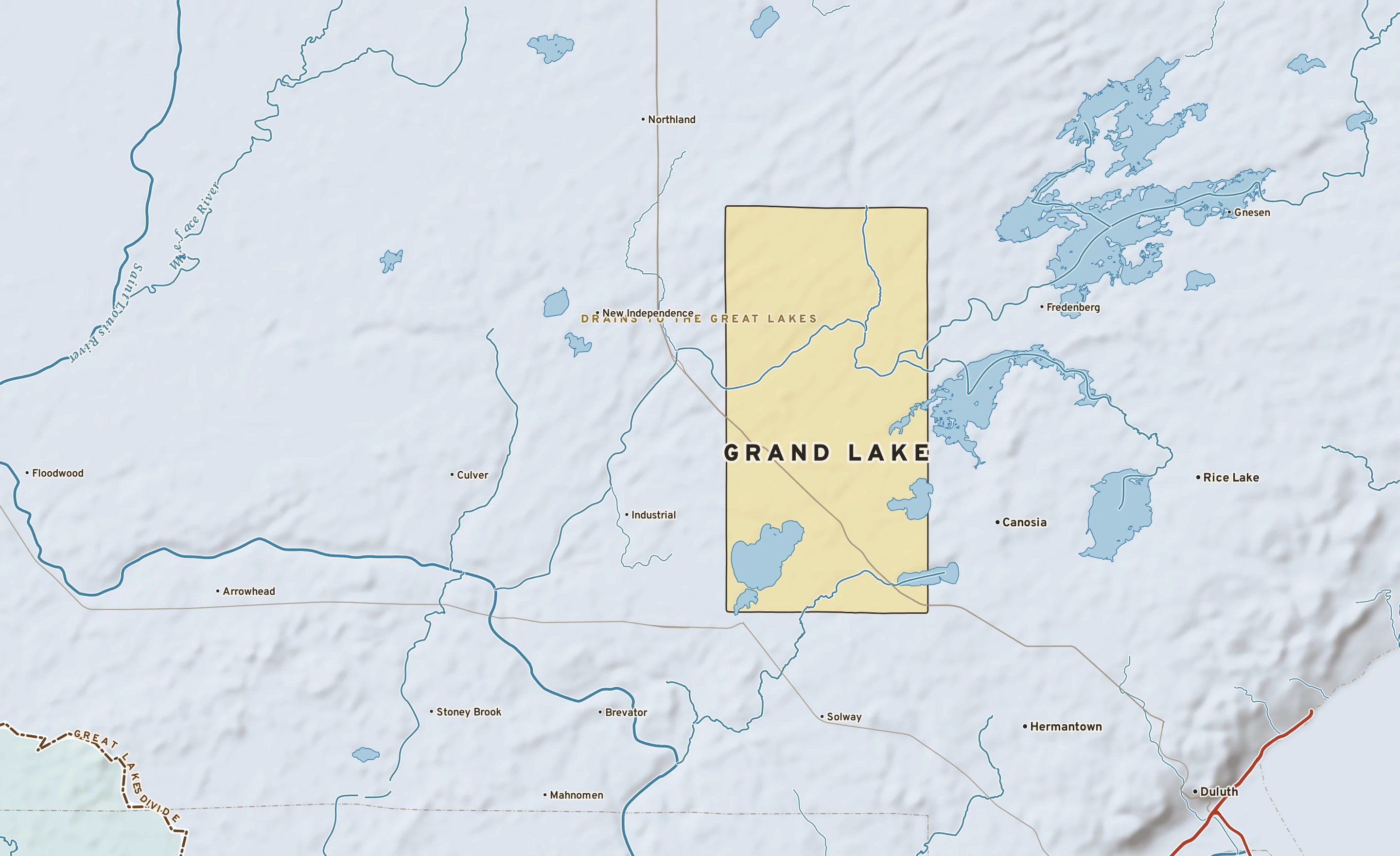 Shaded-relief atlas plate of Grand Lake, Minnesota: rivers, roads, the city limits and where the water drains.