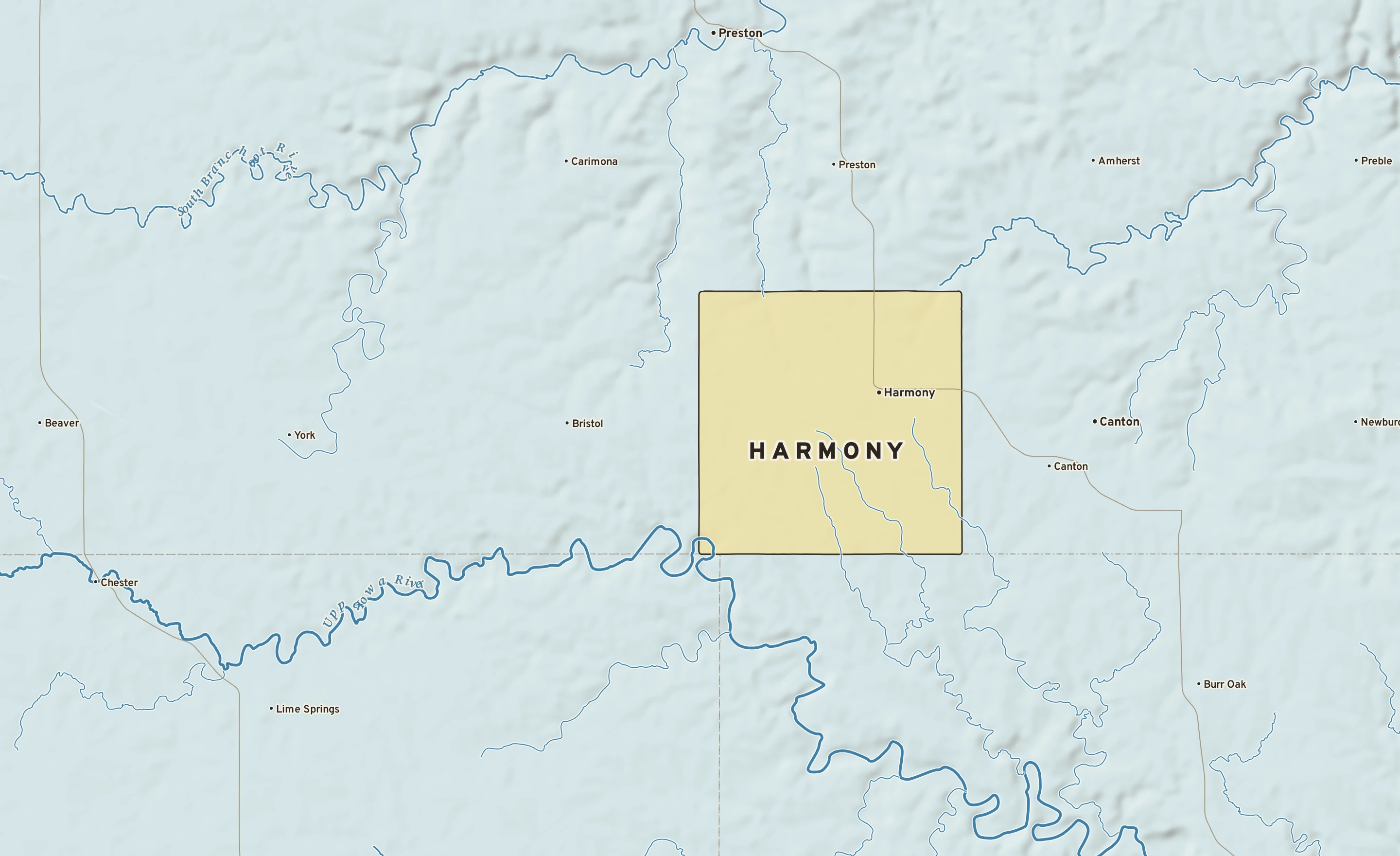 Shaded-relief atlas plate of Harmony, Minnesota: rivers, roads, the city limits and where the water drains.