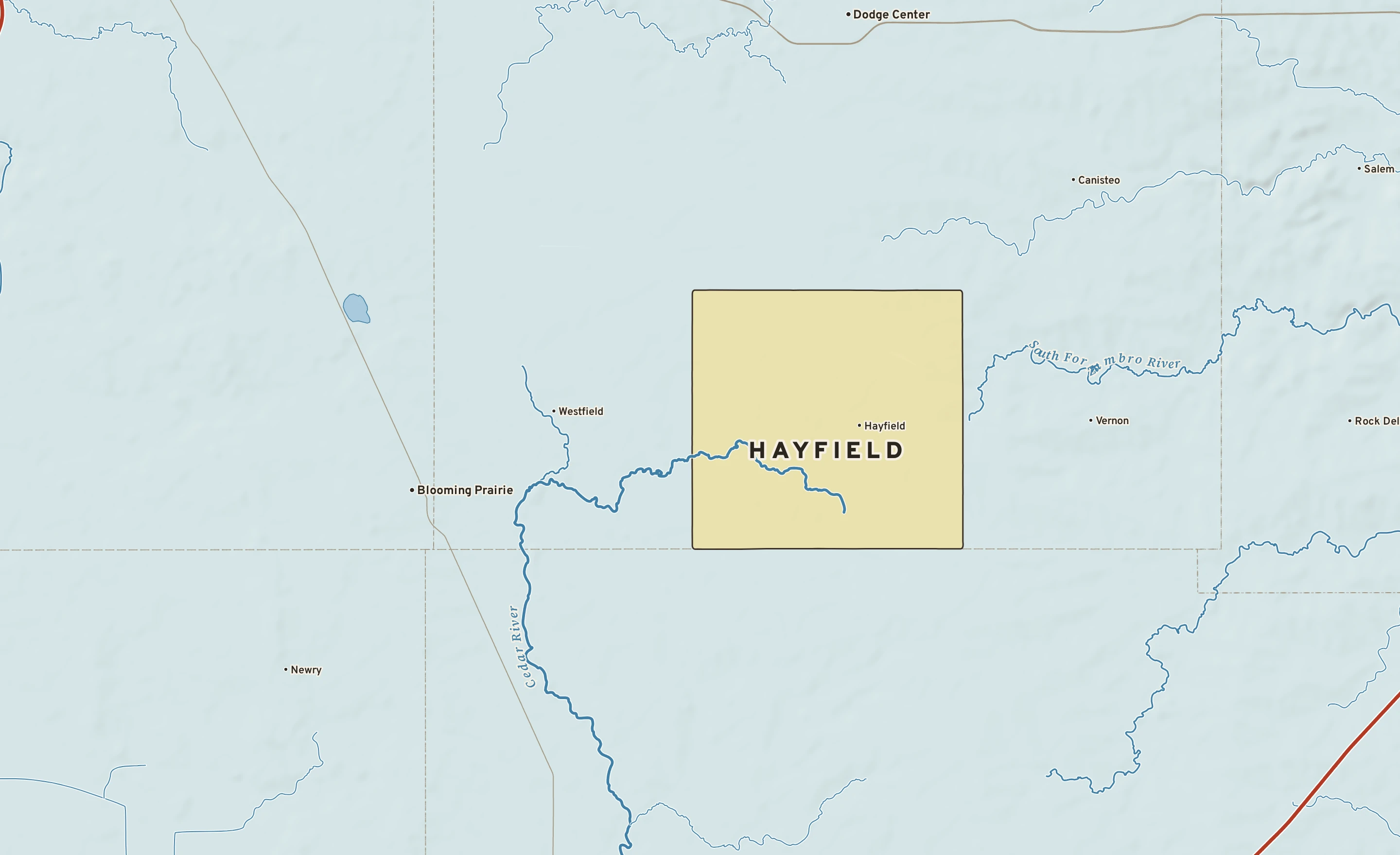 Shaded-relief atlas plate of Hayfield, Minnesota: rivers, roads, the city limits and where the water drains.