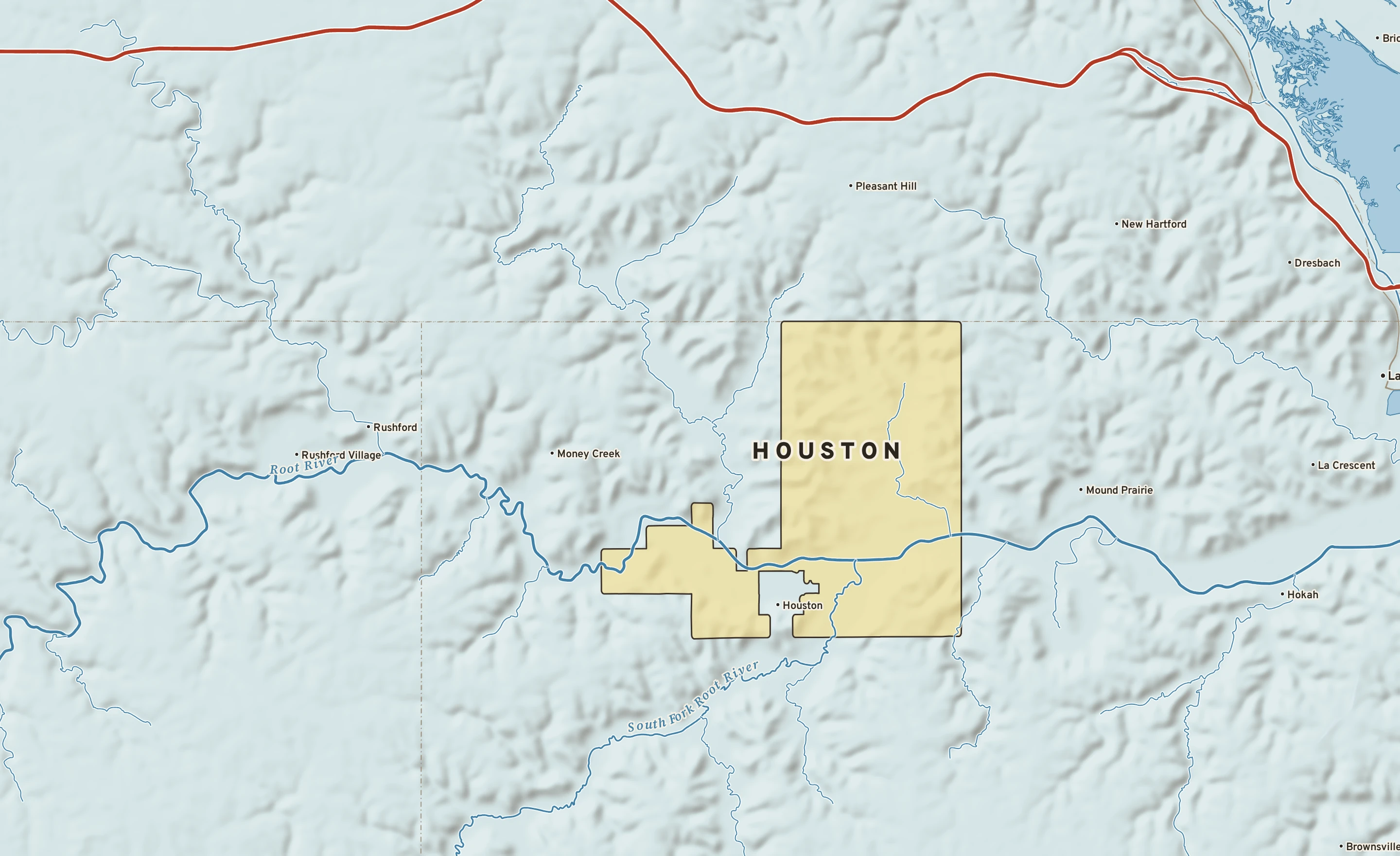 Shaded-relief atlas plate of Houston, Minnesota: rivers, roads, the city limits and where the water drains.