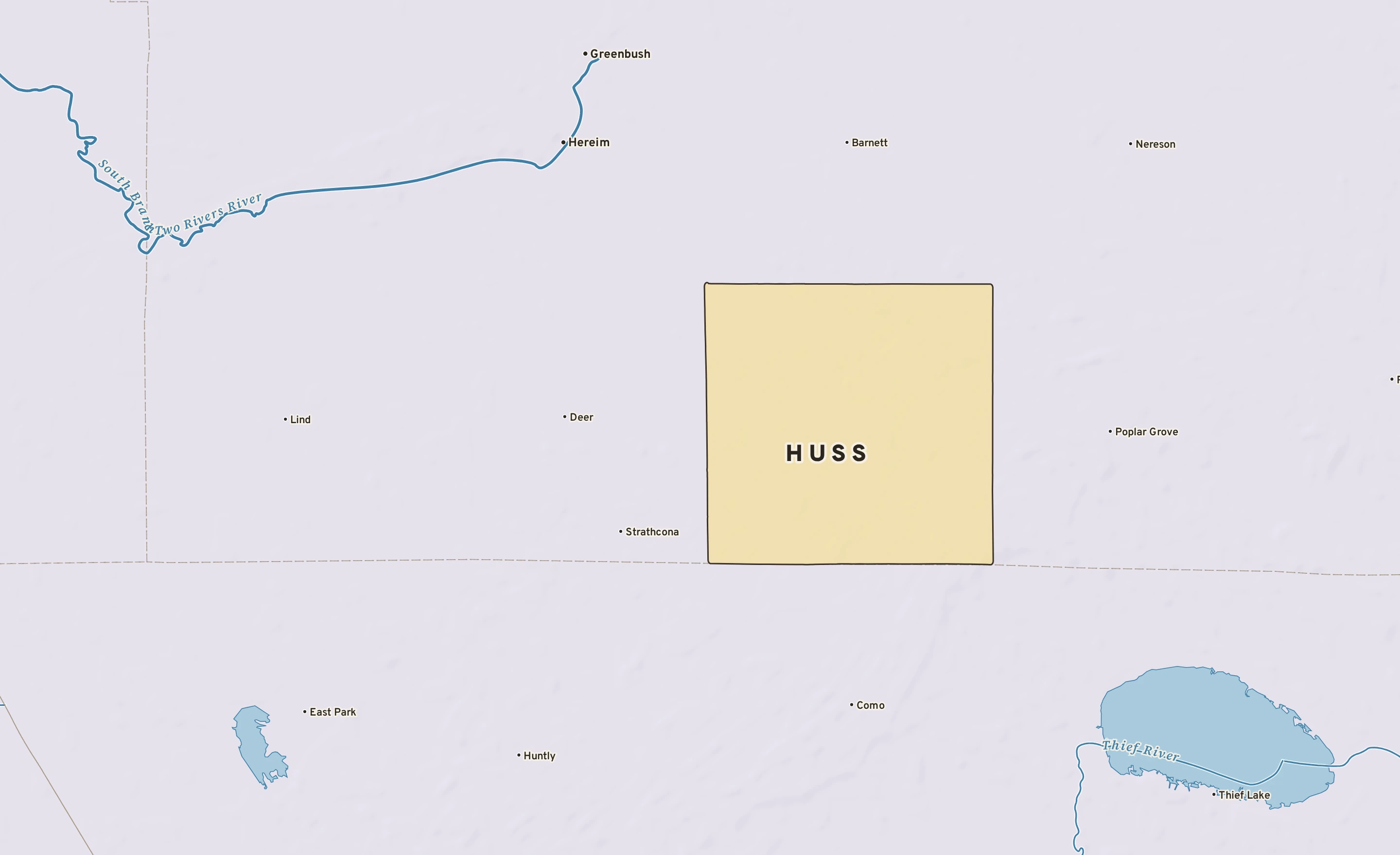 Shaded-relief atlas plate of Huss, Minnesota: rivers, roads, the city limits and where the water drains.