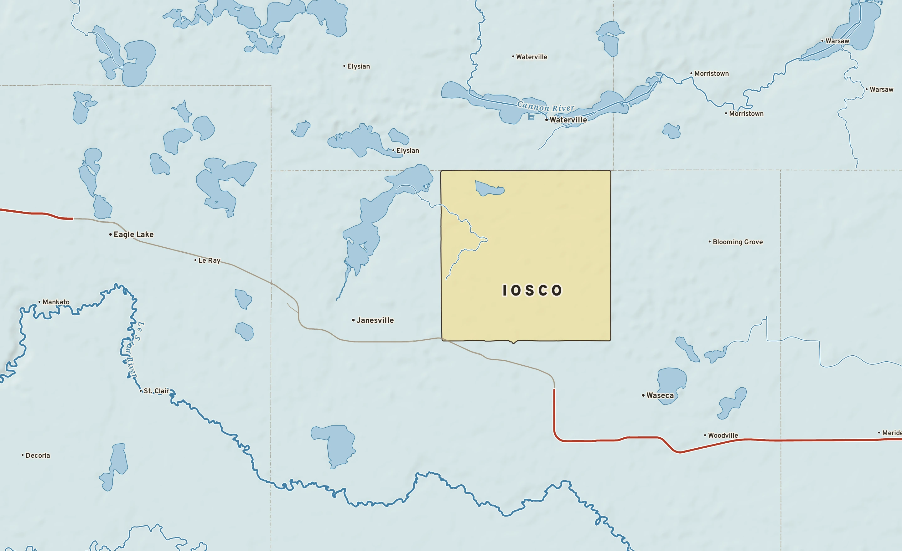 Shaded-relief atlas plate of Iosco, Minnesota: rivers, roads, the city limits and where the water drains.