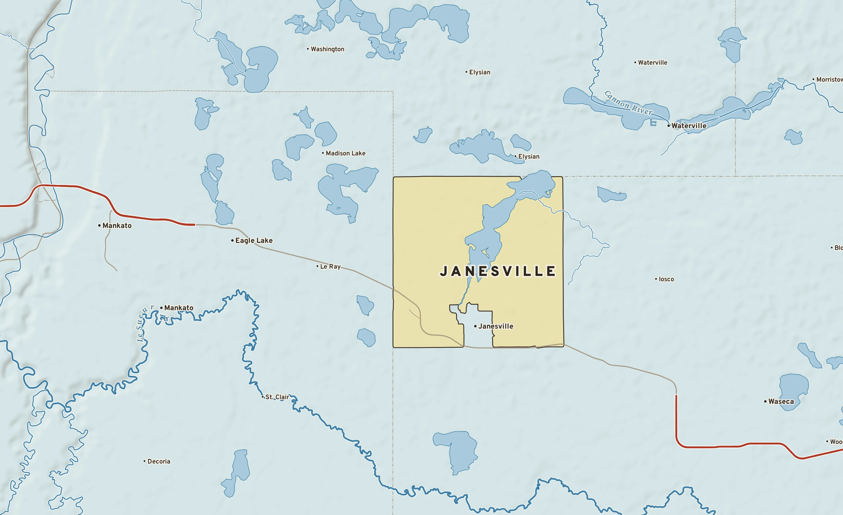 Shaded-relief atlas plate of Janesville, Minnesota: rivers, roads, the city limits and where the water drains.