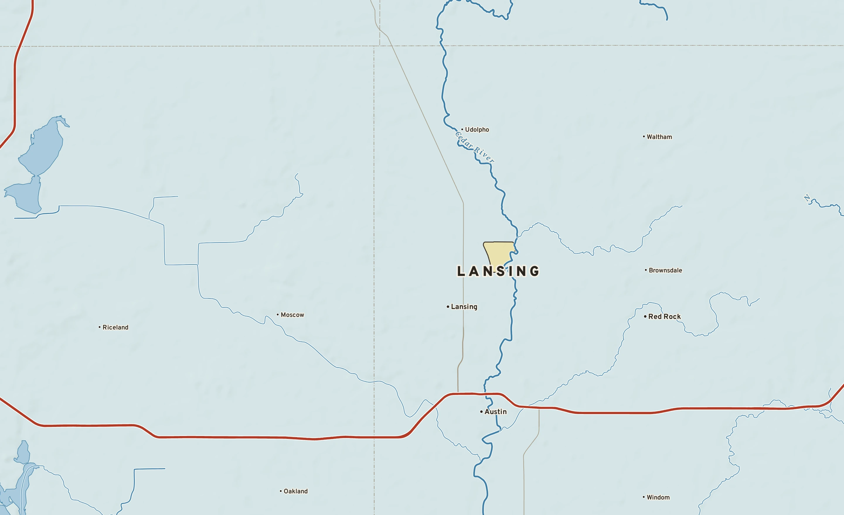 Shaded-relief atlas plate of Lansing, Minnesota: rivers, roads, the city limits and where the water drains.