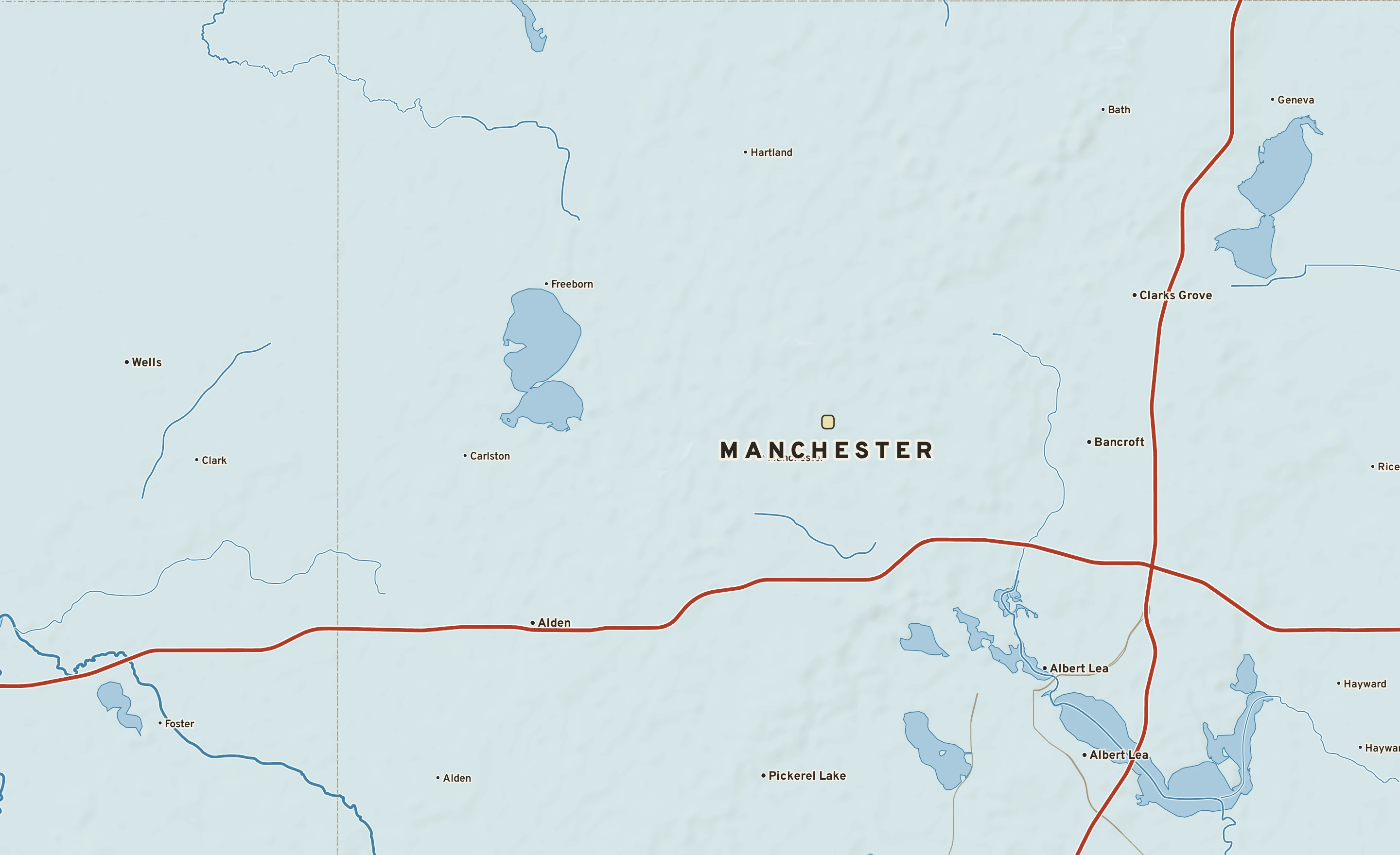 Shaded-relief atlas plate of Manchester, Minnesota: rivers, roads, the city limits and where the water drains.