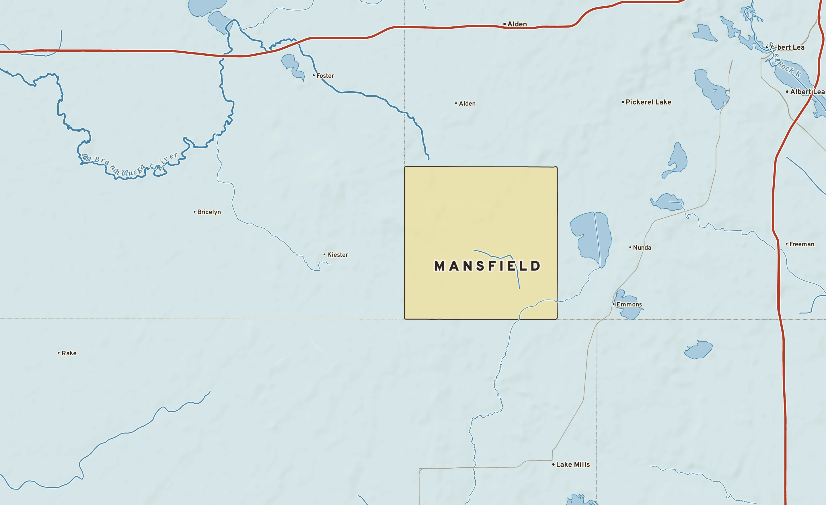Shaded-relief atlas plate of Mansfield, Minnesota: rivers, roads, the city limits and where the water drains.