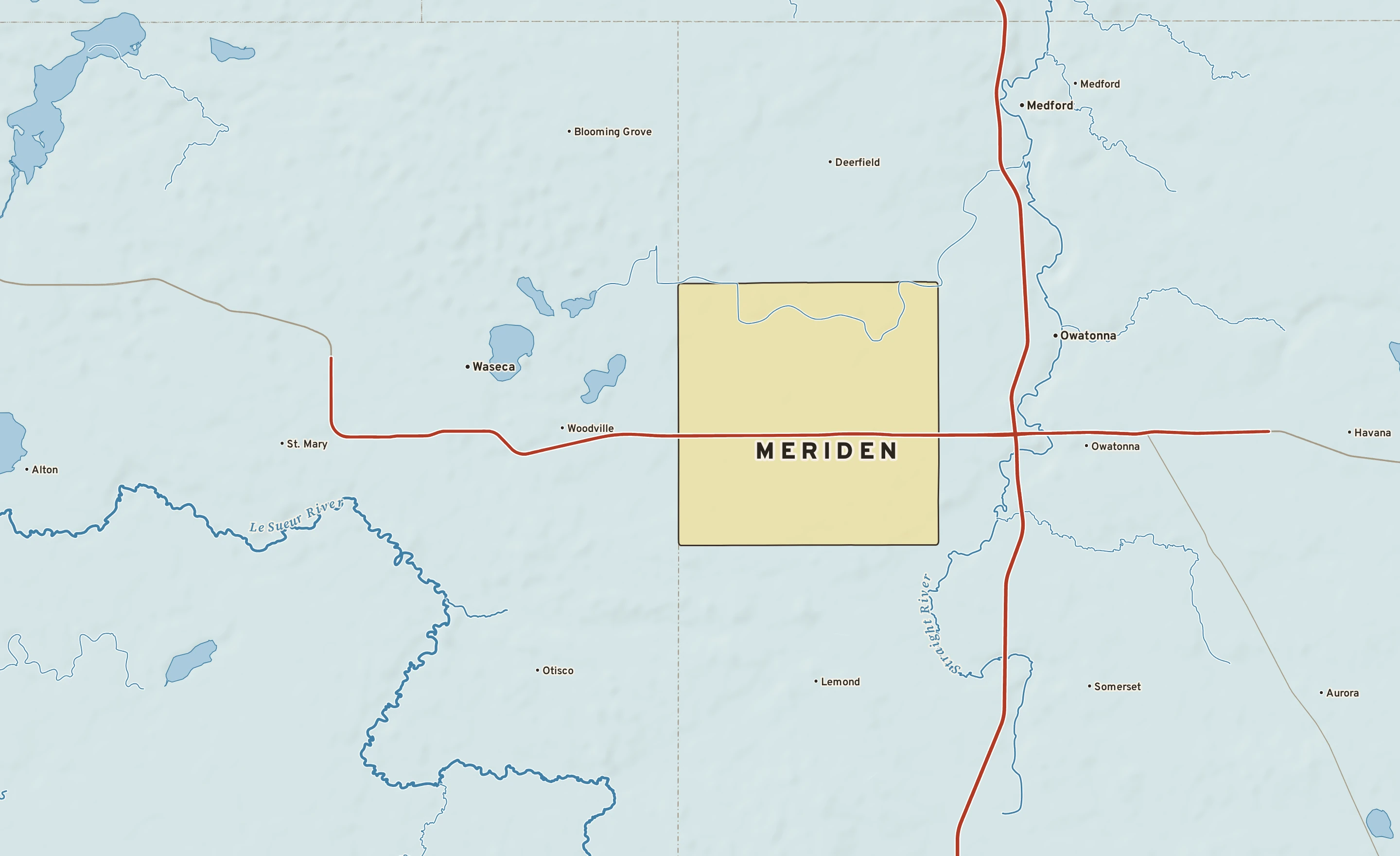 Shaded-relief atlas plate of Meriden, Minnesota: rivers, roads, the city limits and where the water drains.