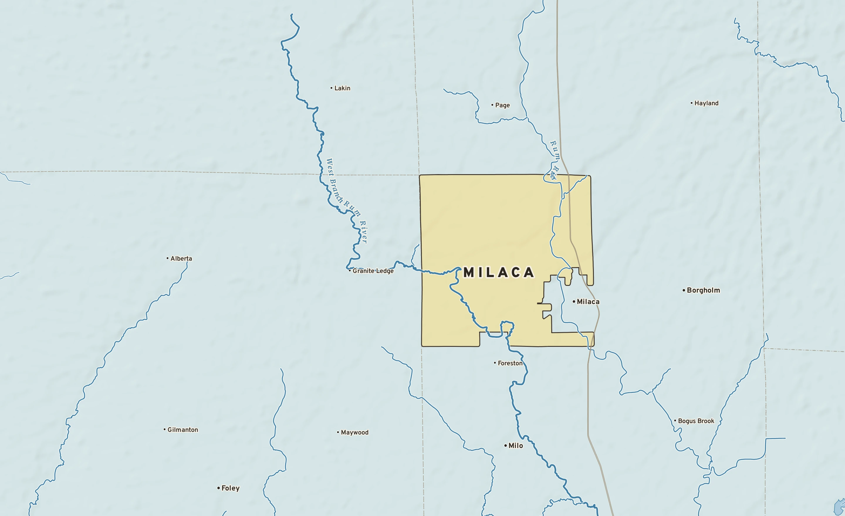Shaded-relief atlas plate of Milaca, Minnesota: rivers, roads, the city limits and where the water drains.