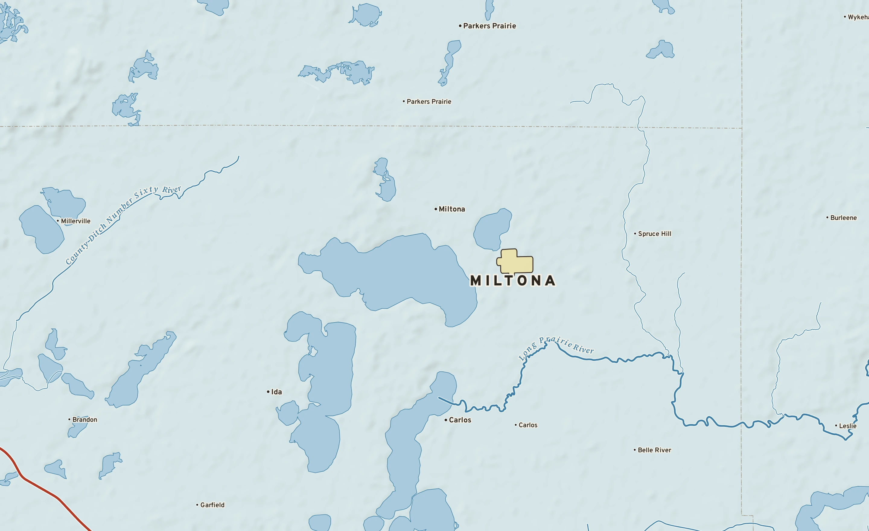 Shaded-relief atlas plate of Miltona, Minnesota: rivers, roads, the city limits and where the water drains.
