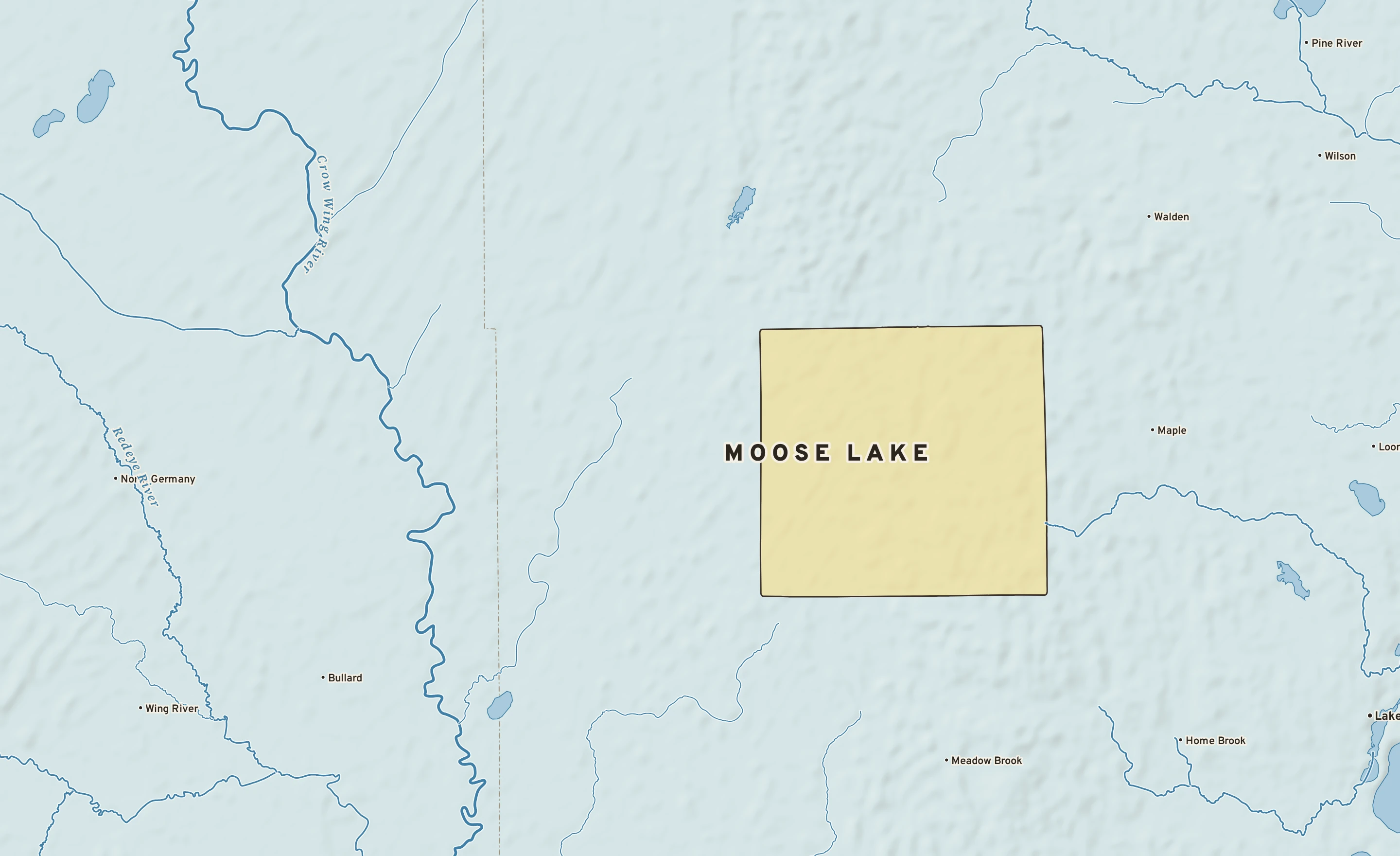 Shaded-relief atlas plate of Moose Lake, Minnesota: rivers, roads, the city limits and where the water drains.