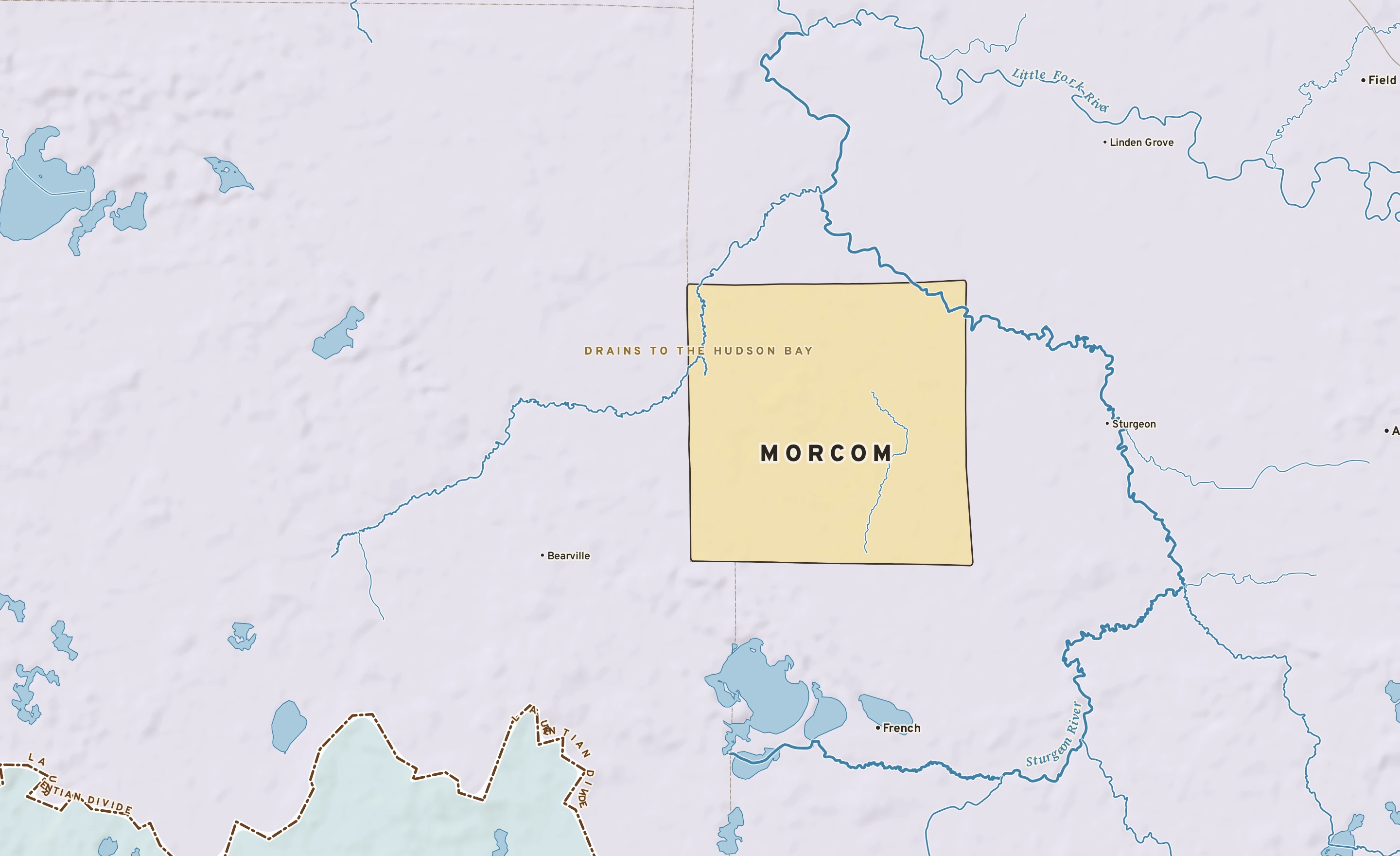 Shaded-relief atlas plate of Morcom, Minnesota: rivers, roads, the city limits and where the water drains.