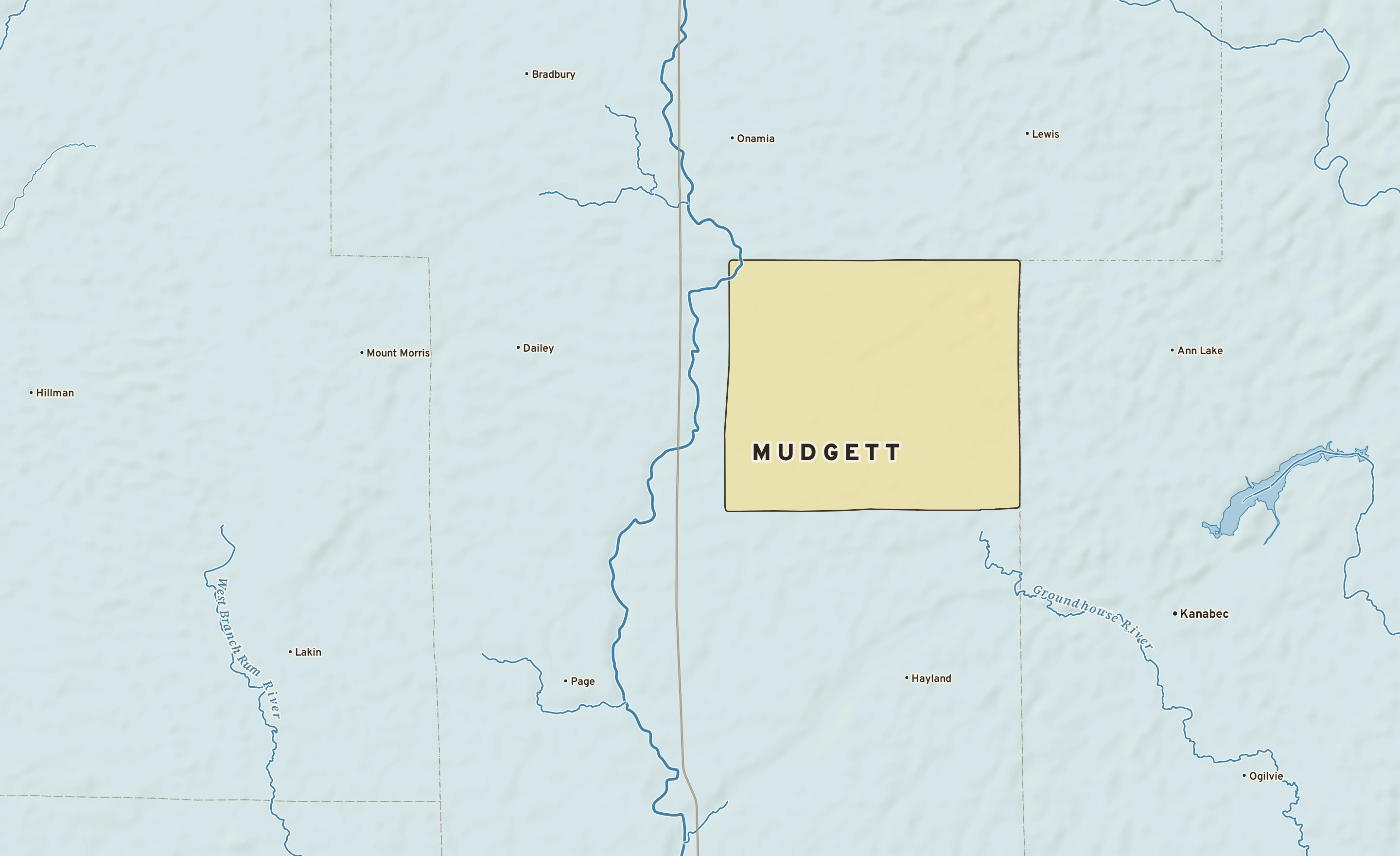 Shaded-relief atlas plate of Mudgett, Minnesota: rivers, roads, the city limits and where the water drains.