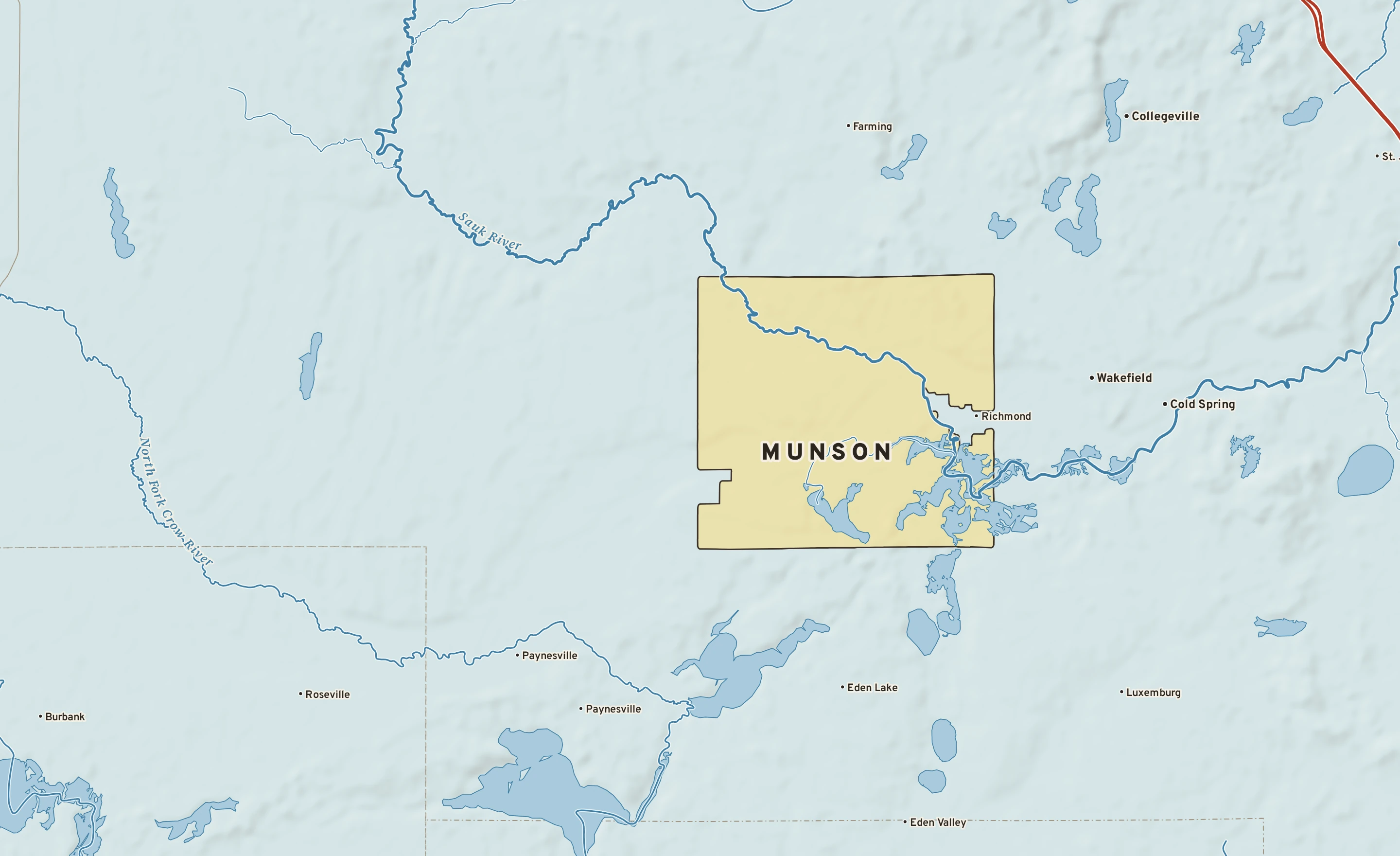 Shaded-relief atlas plate of Munson, Minnesota: rivers, roads, the city limits and where the water drains.
