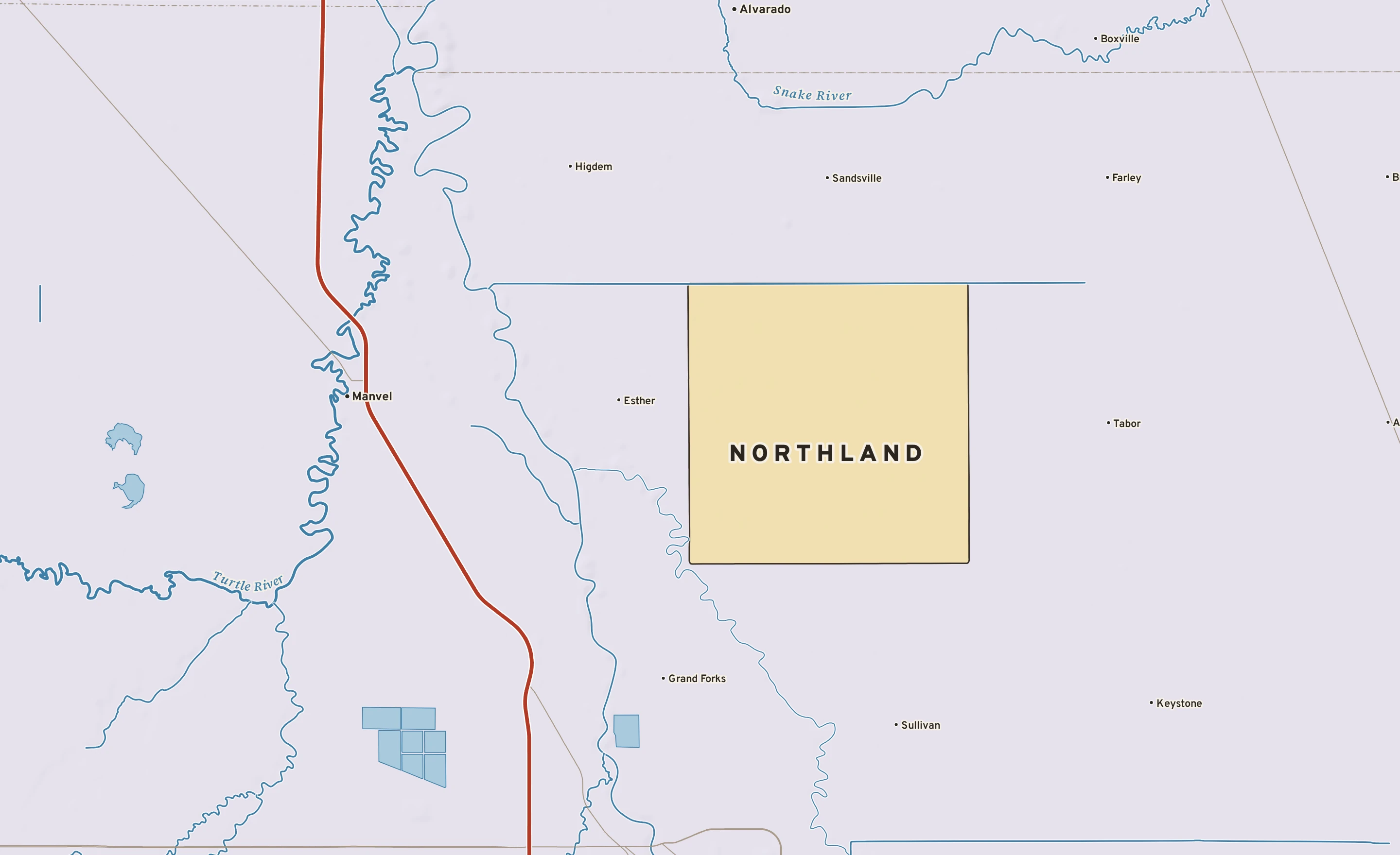 Shaded-relief atlas plate of Northland, Minnesota: rivers, roads, the city limits and where the water drains.