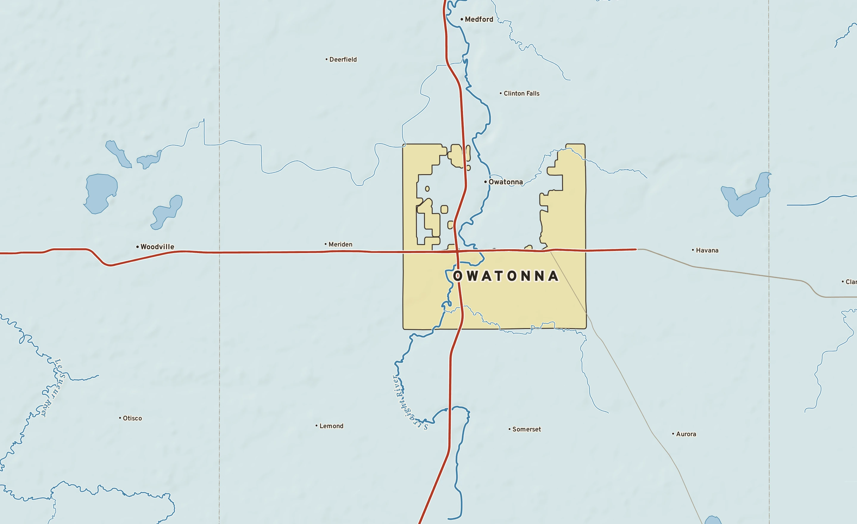 Shaded-relief atlas plate of Owatonna, Minnesota: rivers, roads, the city limits and where the water drains.