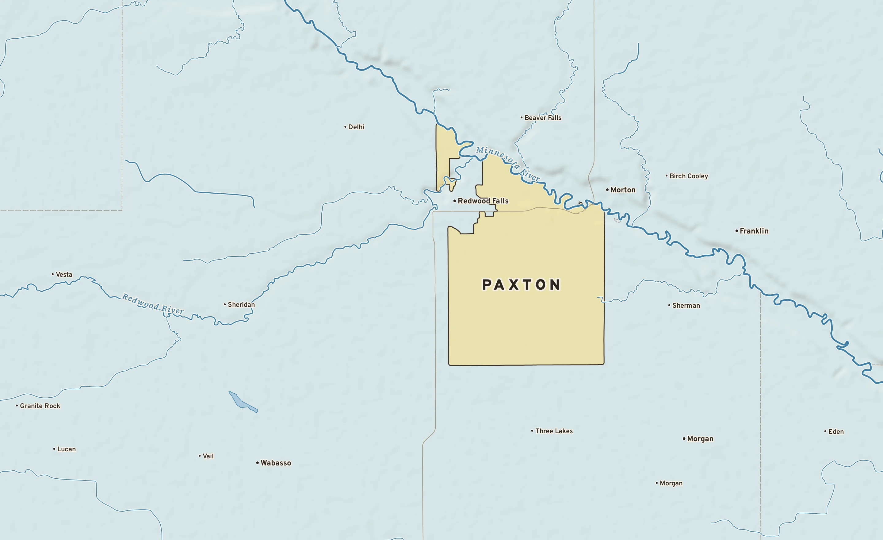 Shaded-relief atlas plate of Paxton, Minnesota: rivers, roads, the city limits and where the water drains.