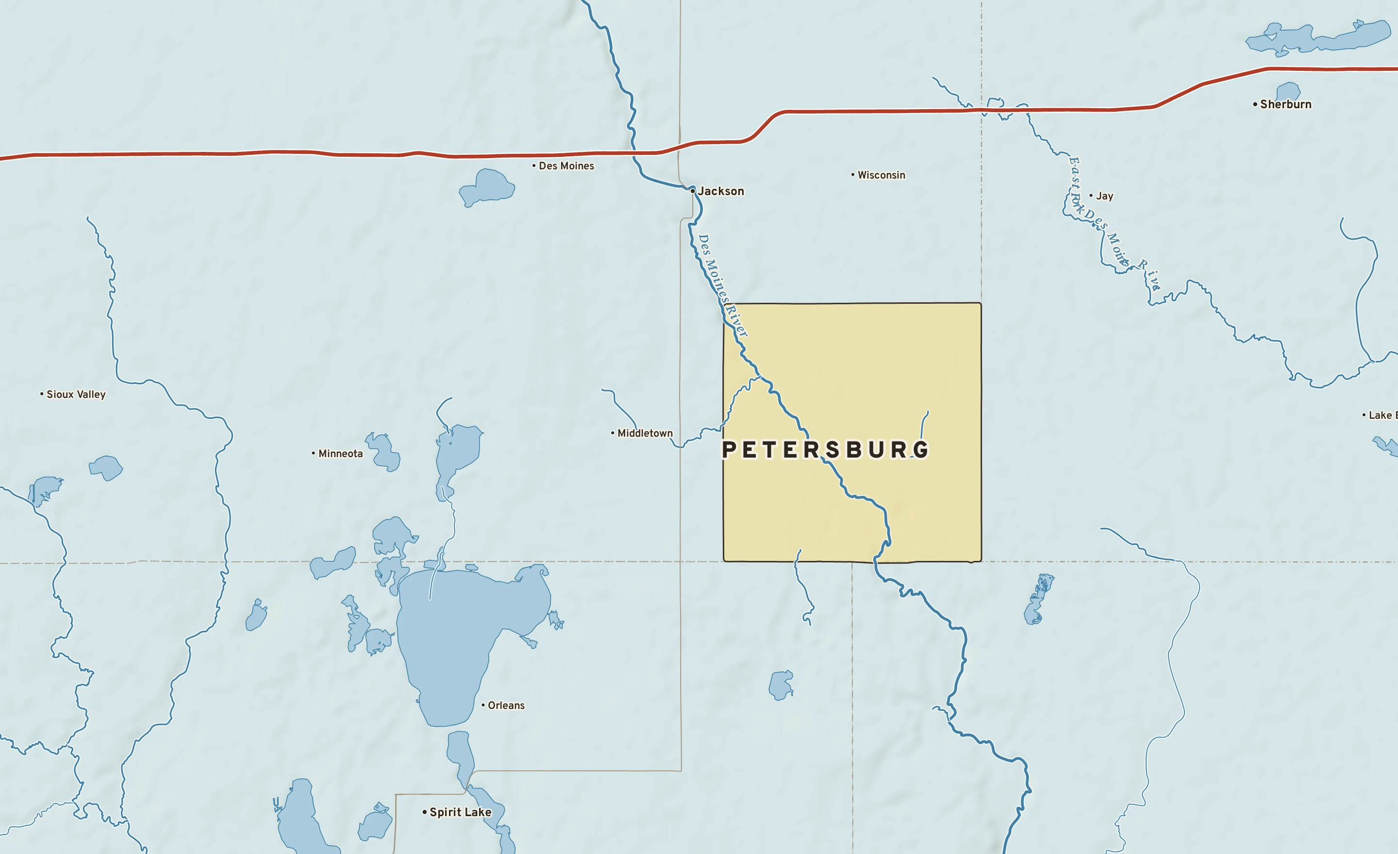 Shaded-relief atlas plate of Petersburg, Minnesota: rivers, roads, the city limits and where the water drains.