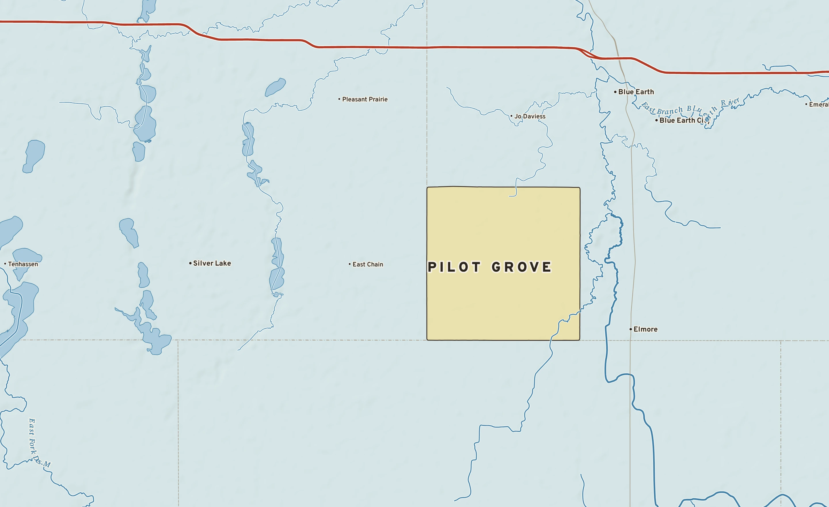 Shaded-relief atlas plate of Pilot Grove, Minnesota: rivers, roads, the city limits and where the water drains.