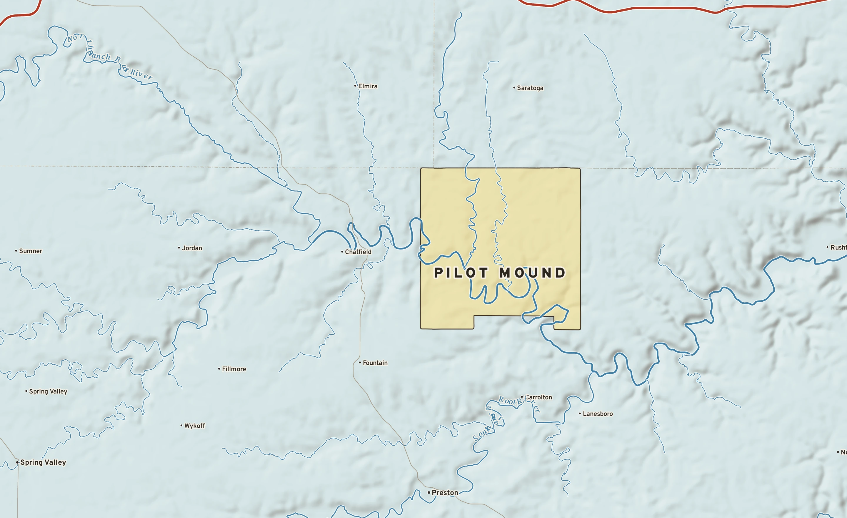 Shaded-relief atlas plate of Pilot Mound, Minnesota: rivers, roads, the city limits and where the water drains.