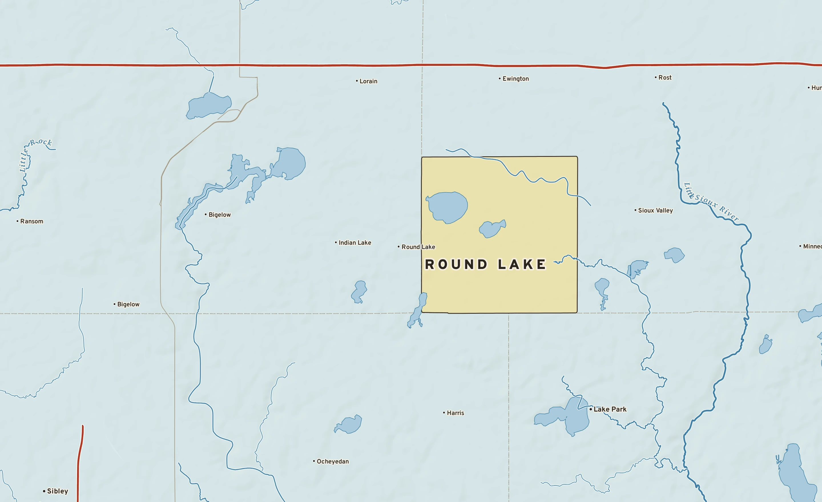 Shaded-relief atlas plate of Round Lake, Minnesota: rivers, roads, the city limits and where the water drains.