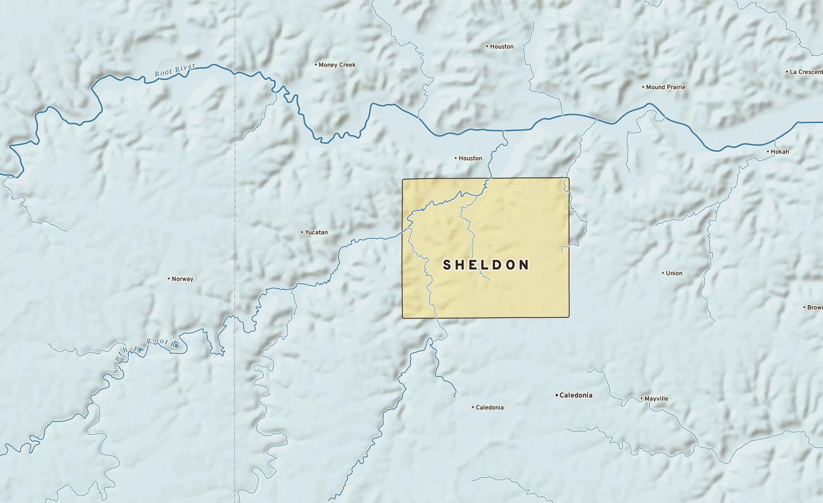 Shaded-relief atlas plate of Sheldon, Minnesota: rivers, roads, the city limits and where the water drains.