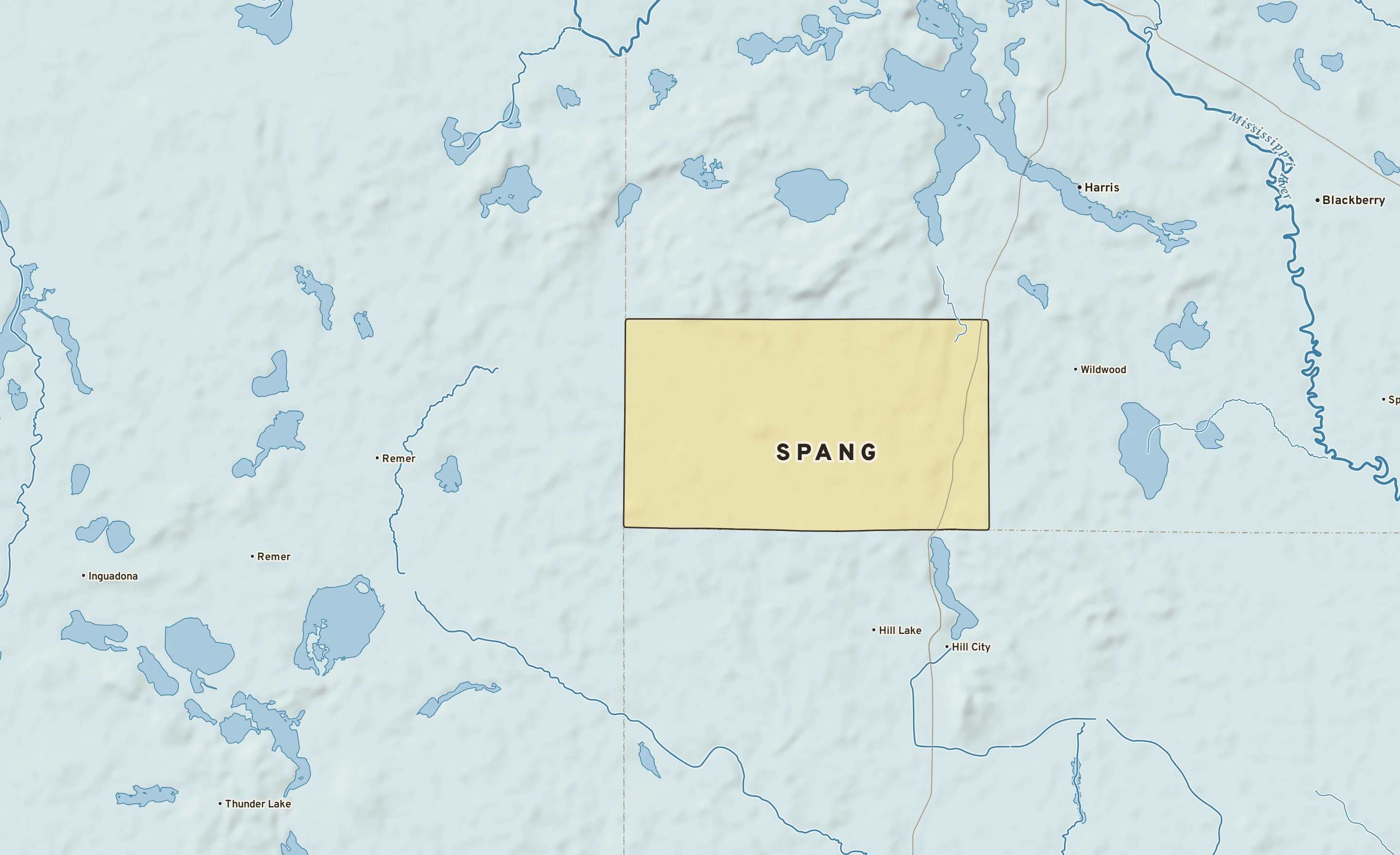 Shaded-relief atlas plate of Spang, Minnesota: rivers, roads, the city limits and where the water drains.