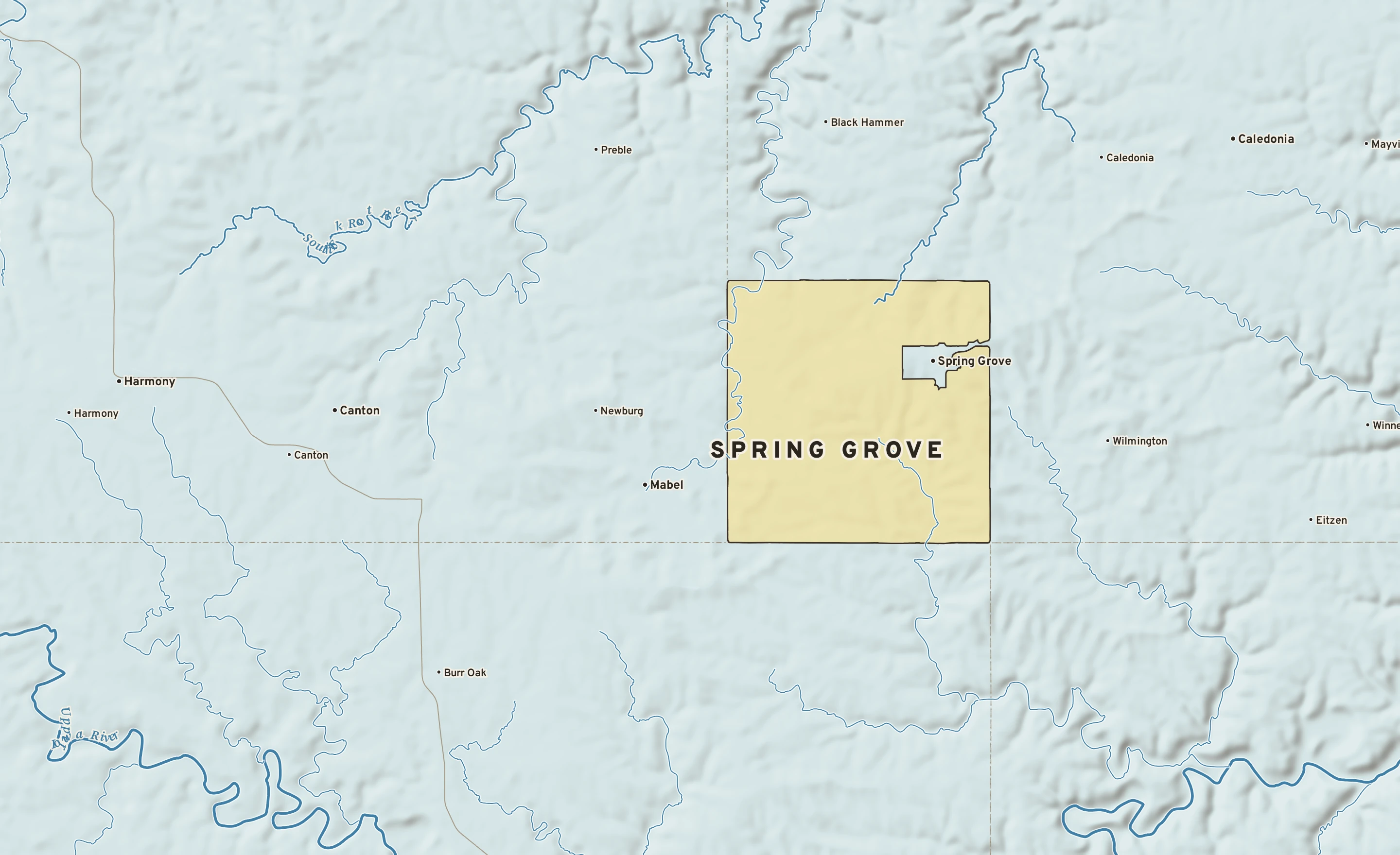 Shaded-relief atlas plate of Spring Grove, Minnesota: rivers, roads, the city limits and where the water drains.