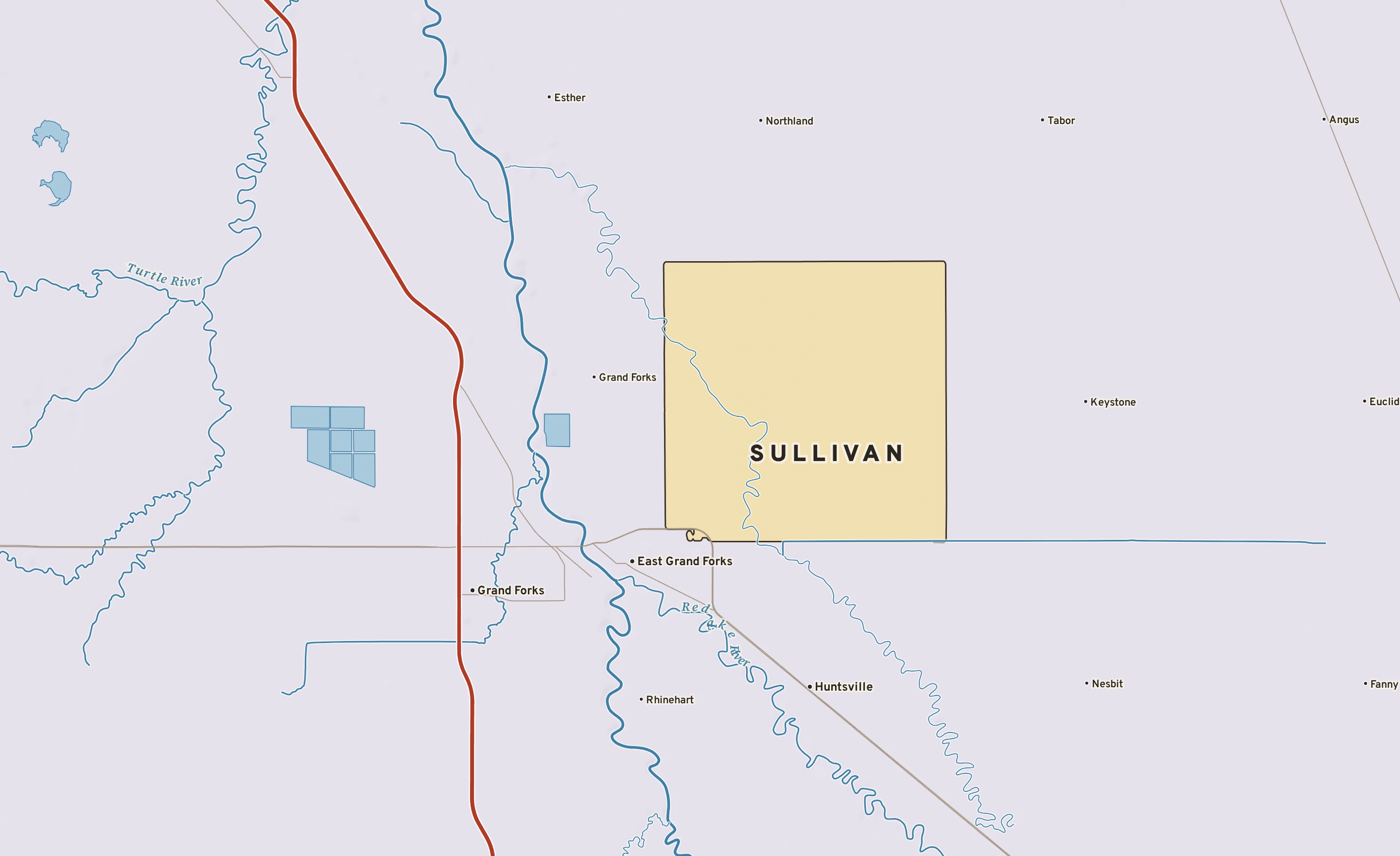 Shaded-relief atlas plate of Sullivan, Minnesota: rivers, roads, the city limits and where the water drains.