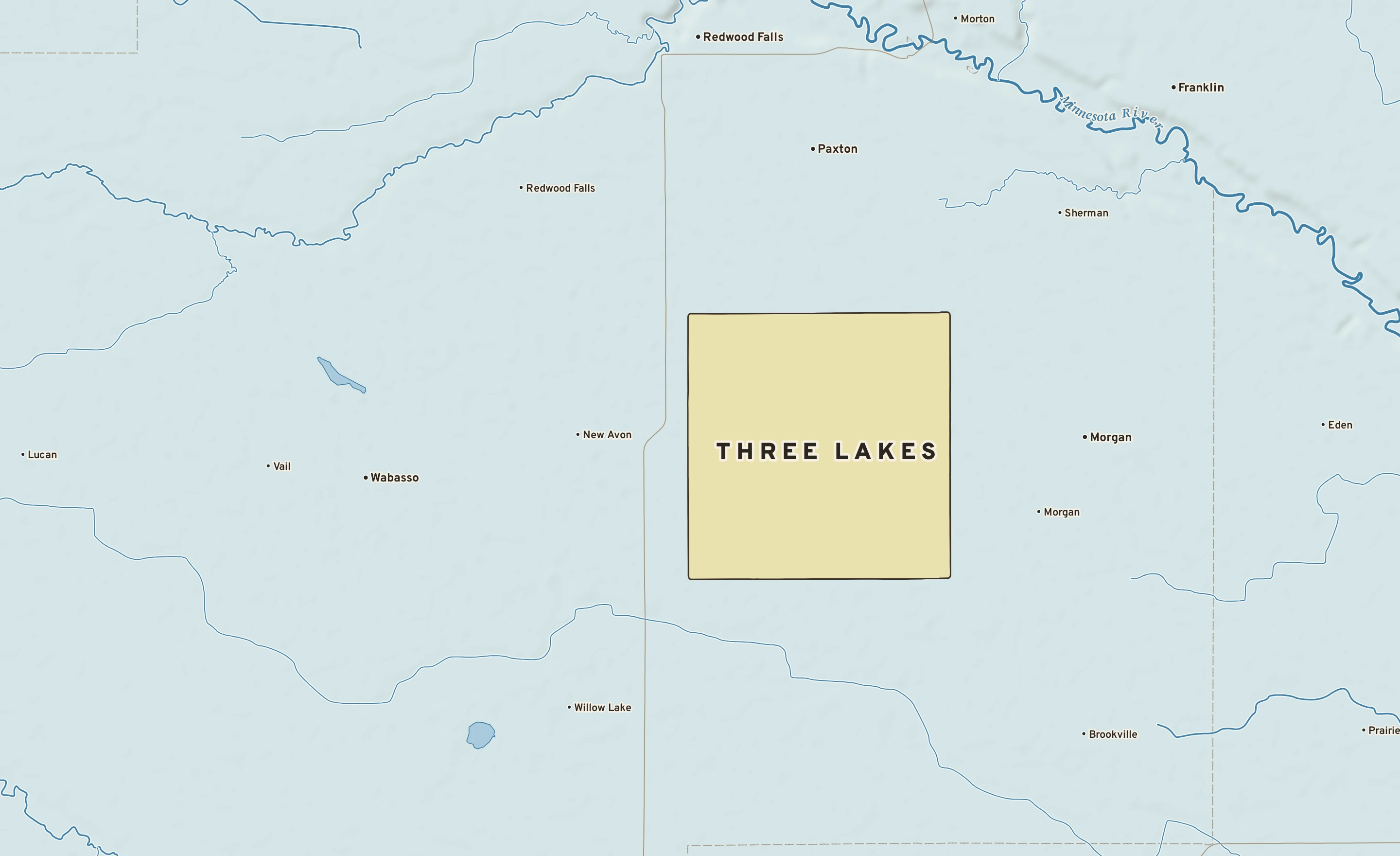 Shaded-relief atlas plate of Three Lakes, Minnesota: rivers, roads, the city limits and where the water drains.