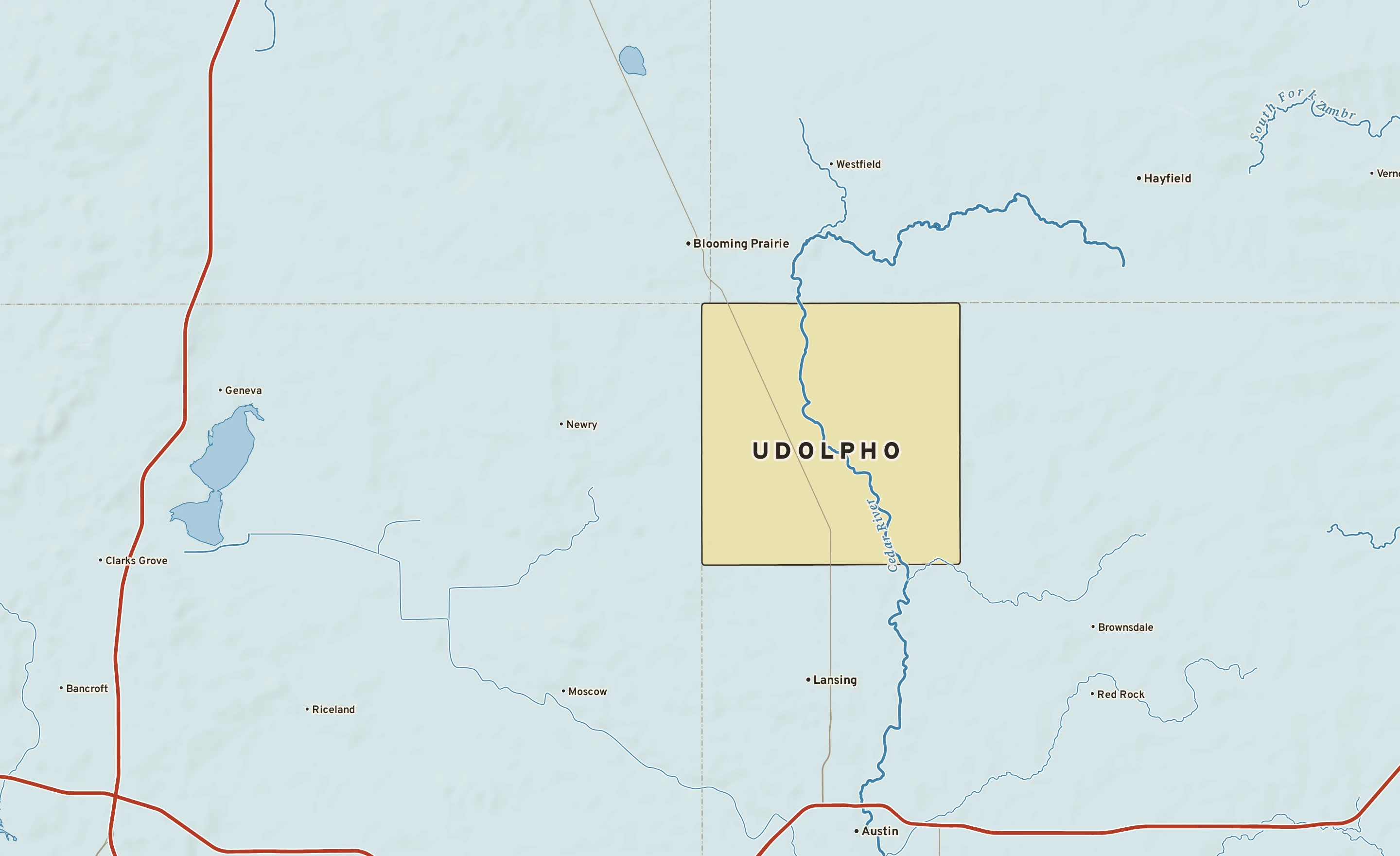 Shaded-relief atlas plate of Udolpho, Minnesota: rivers, roads, the city limits and where the water drains.