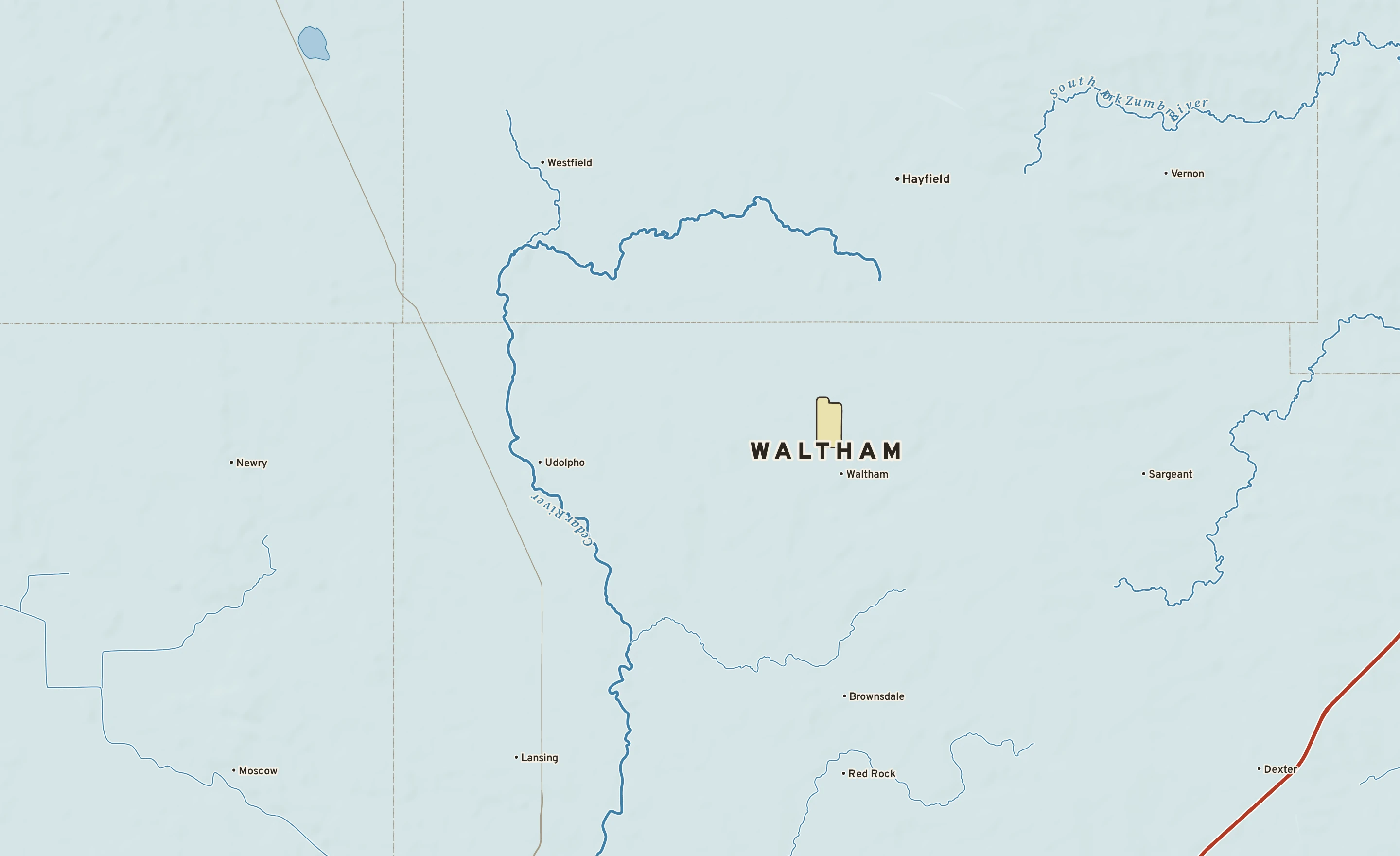 Shaded-relief atlas plate of Waltham, Minnesota: rivers, roads, the city limits and where the water drains.