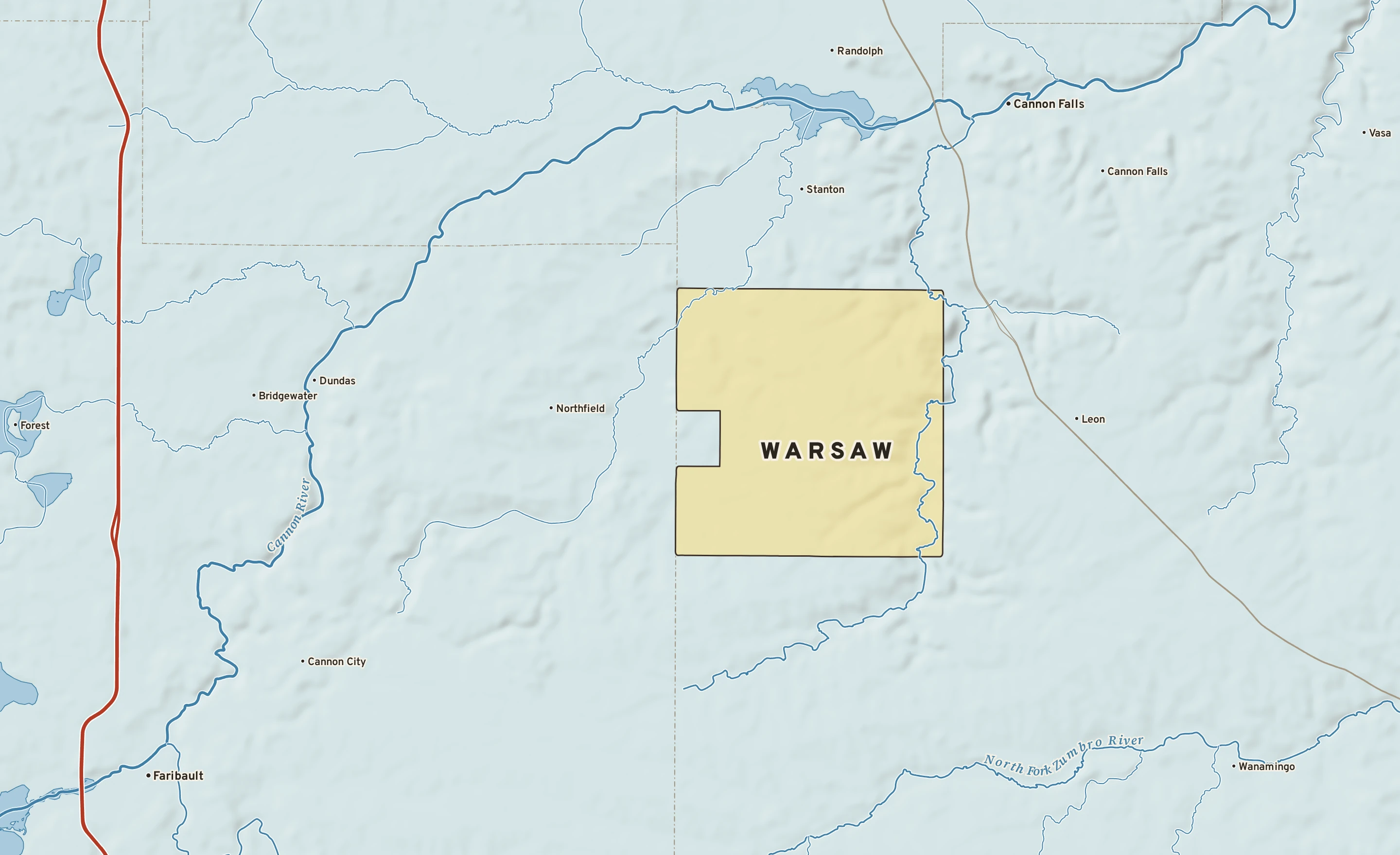 Shaded-relief atlas plate of Warsaw, Minnesota: rivers, roads, the city limits and where the water drains.