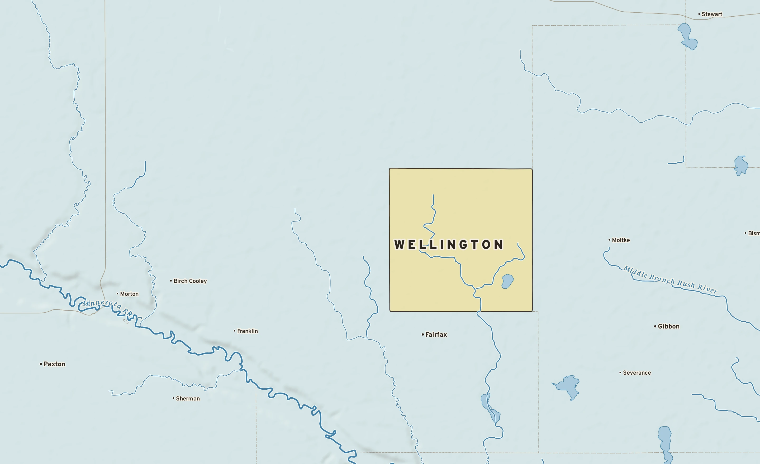 Shaded-relief atlas plate of Wellington, Minnesota: rivers, roads, the city limits and where the water drains.
