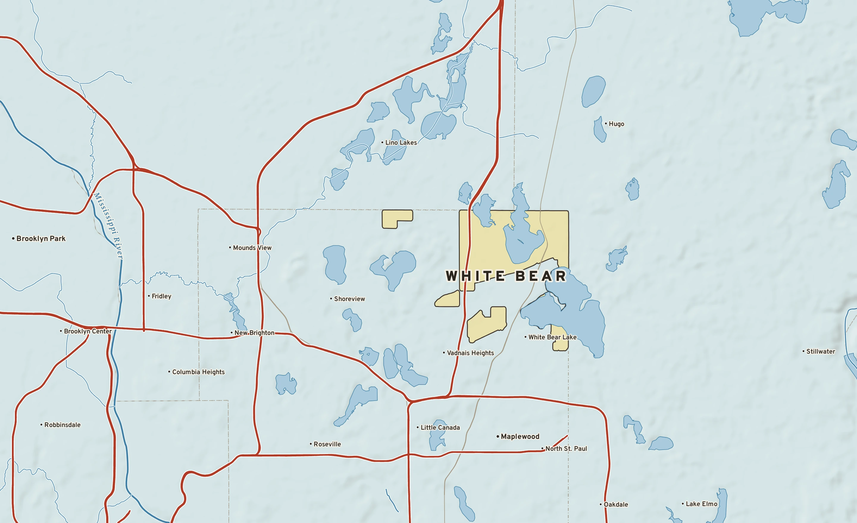 Shaded-relief atlas plate of White Bear, Minnesota: rivers, roads, the city limits and where the water drains.