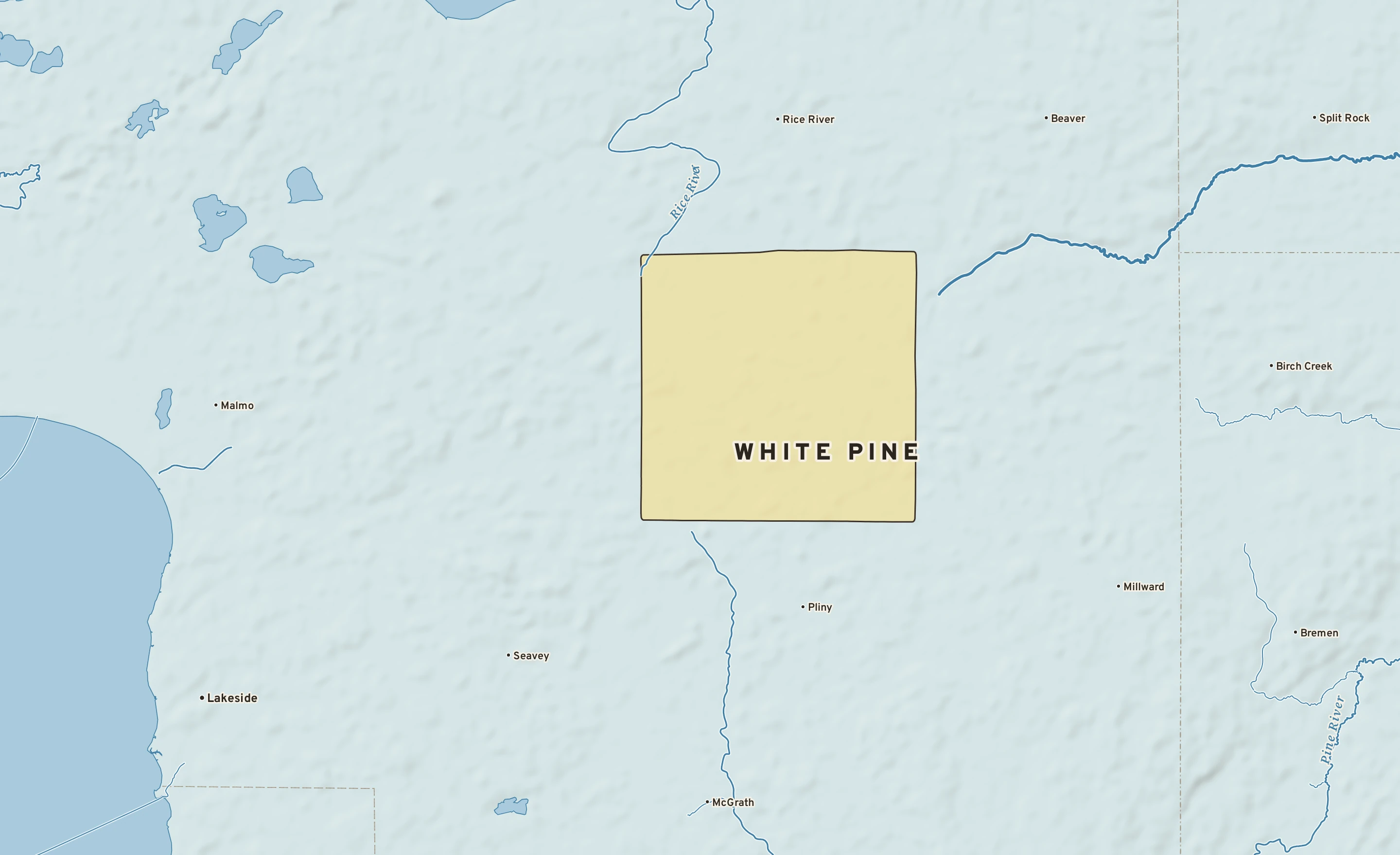 Shaded-relief atlas plate of White Pine, Minnesota: rivers, roads, the city limits and where the water drains.
