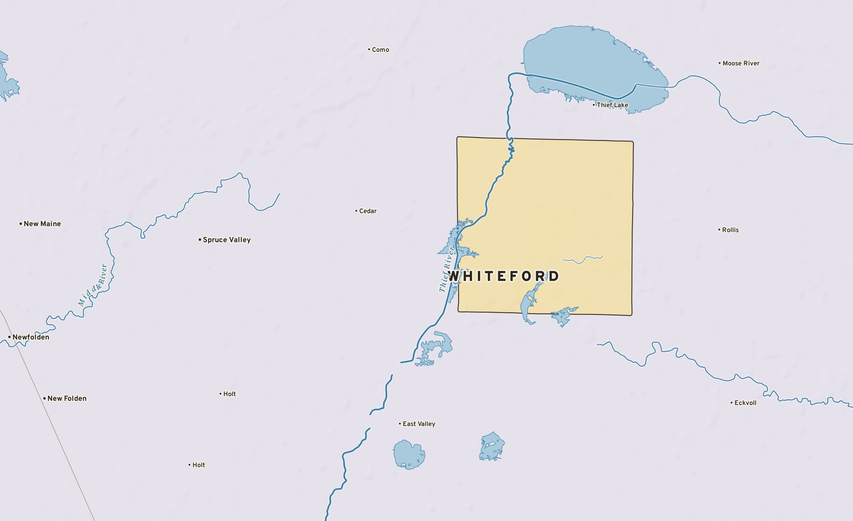 Shaded-relief atlas plate of Whiteford, Minnesota: rivers, roads, the city limits and where the water drains.
