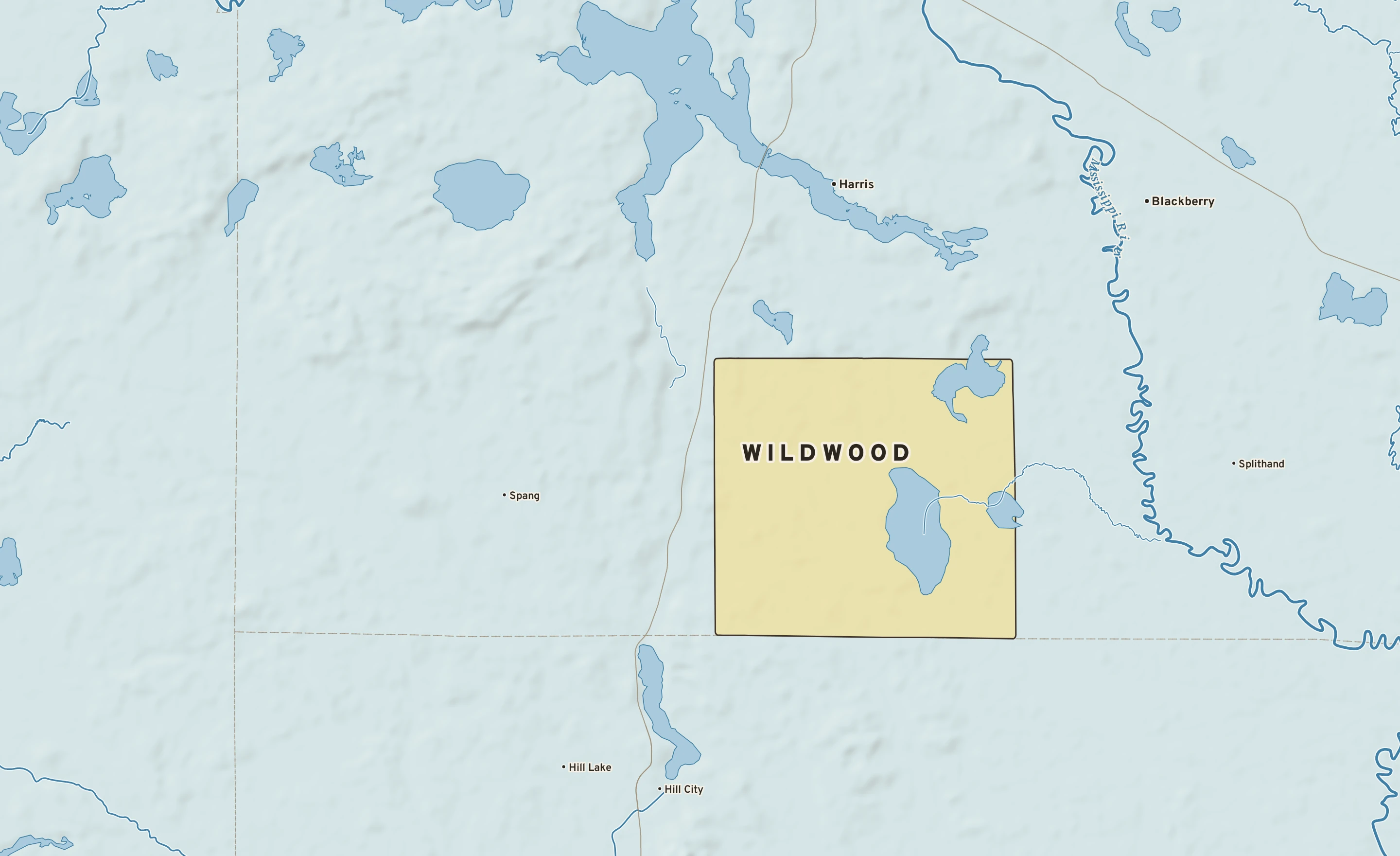 Shaded-relief atlas plate of Wildwood, Minnesota: rivers, roads, the city limits and where the water drains.