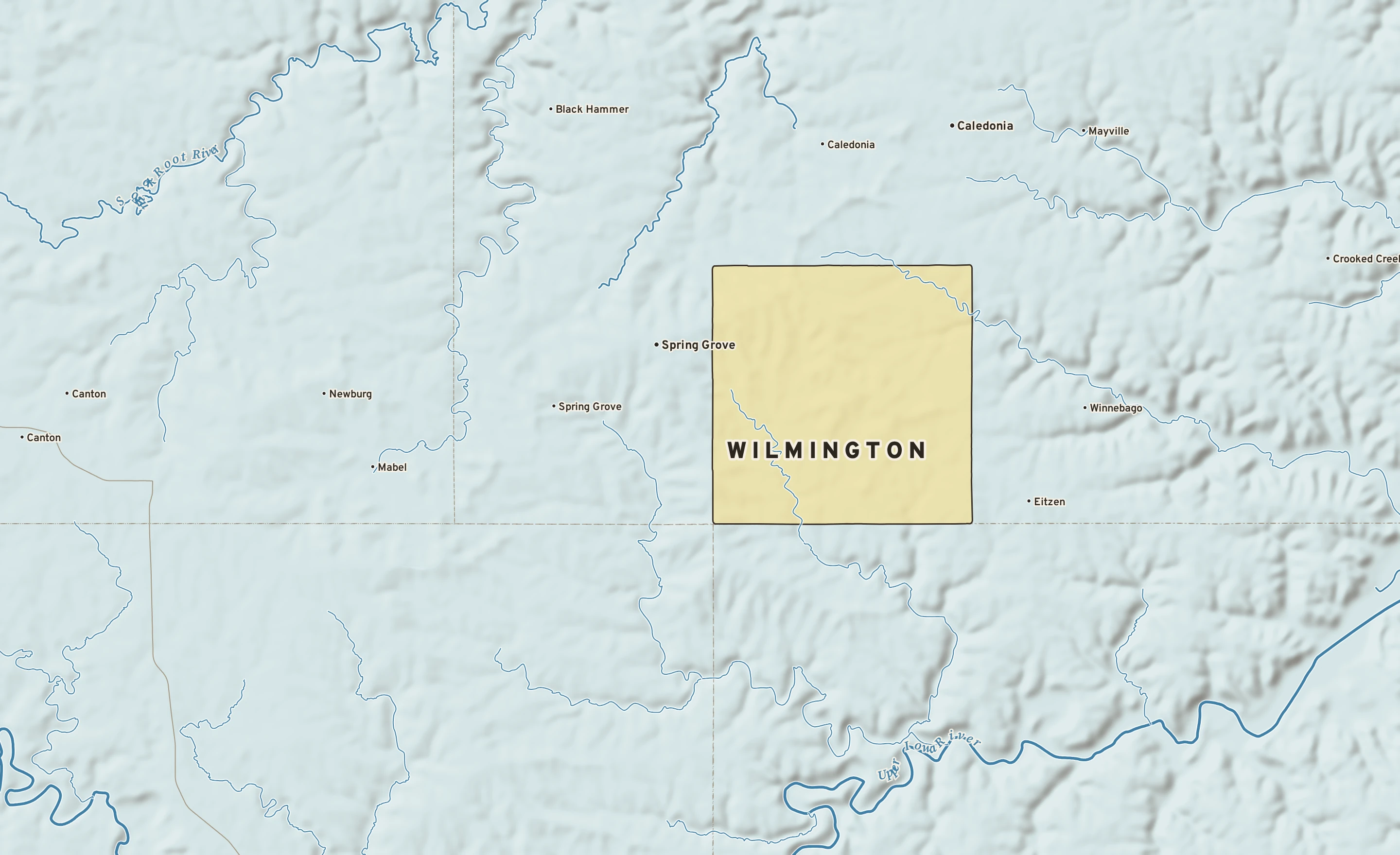 Shaded-relief atlas plate of Wilmington, Minnesota: rivers, roads, the city limits and where the water drains.